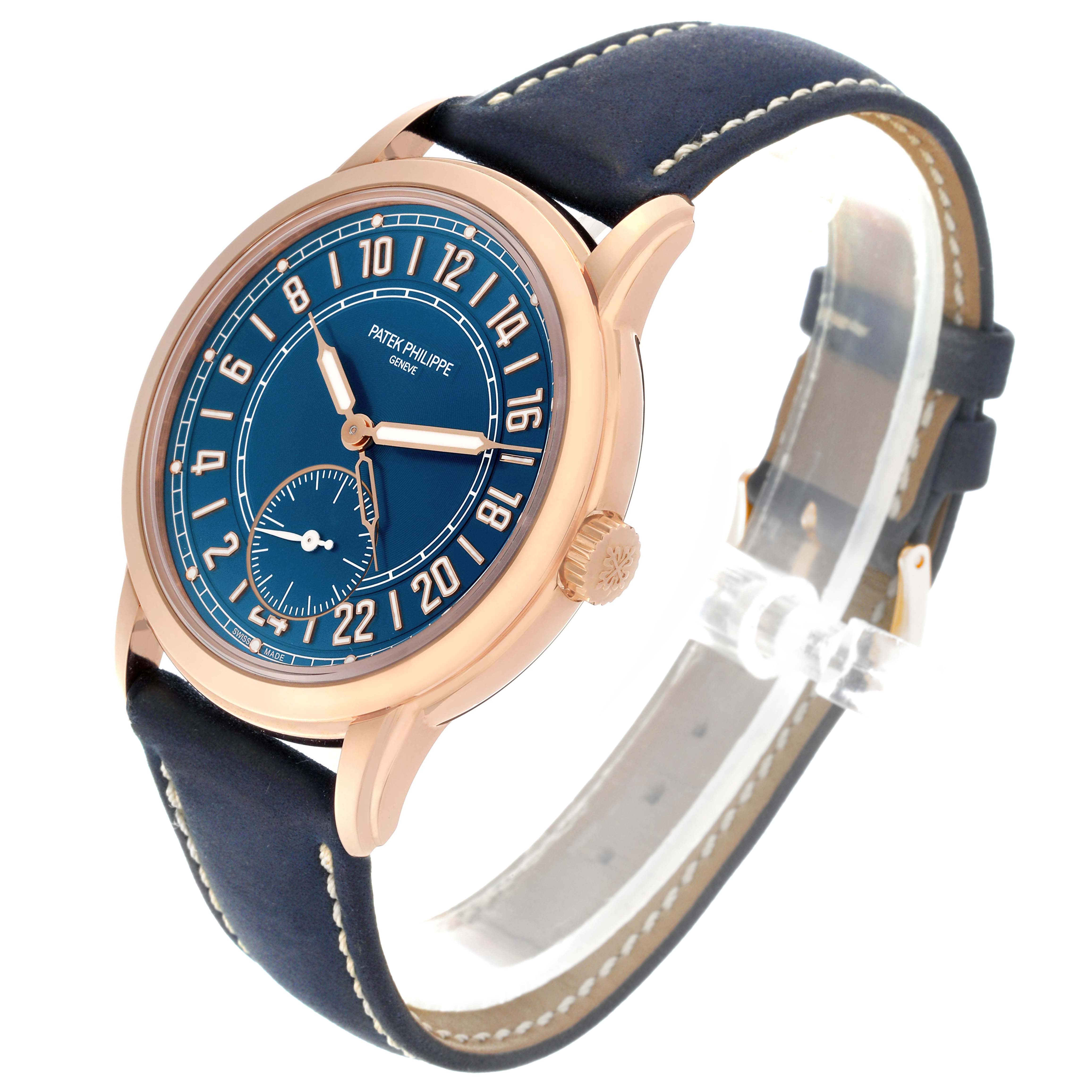 This Patek Philippe Calatrava 5224R-001 Men's Rose Gold Blue Dial 5224R-001 Men's Rose Gold Blue Dial watch is shown at a three-quarter angle, highlighting the face, bezel, crown, and strap.