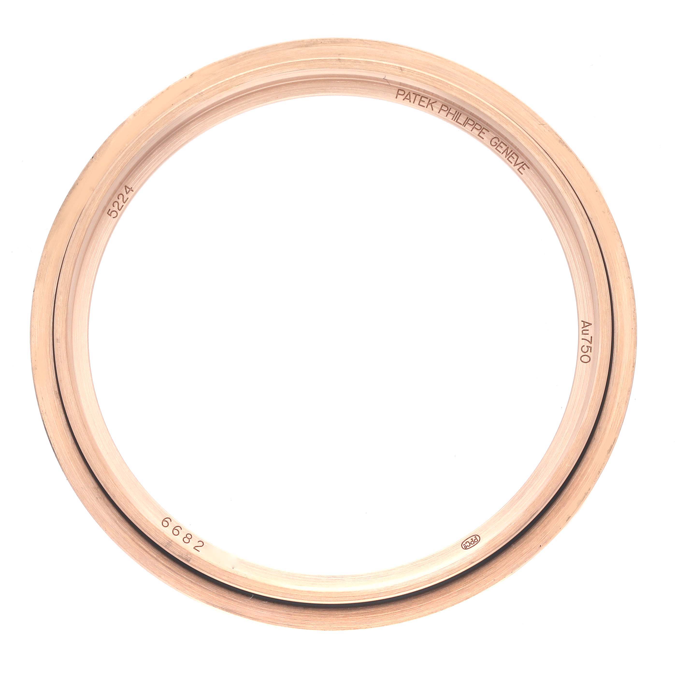 The image shows the bezel of a Patek Philippe Calatrava 5224R-001 Men's Rose Gold Blue Dial 5224R-001 Men's Rose Gold Blue Dial watch, viewed from the top.