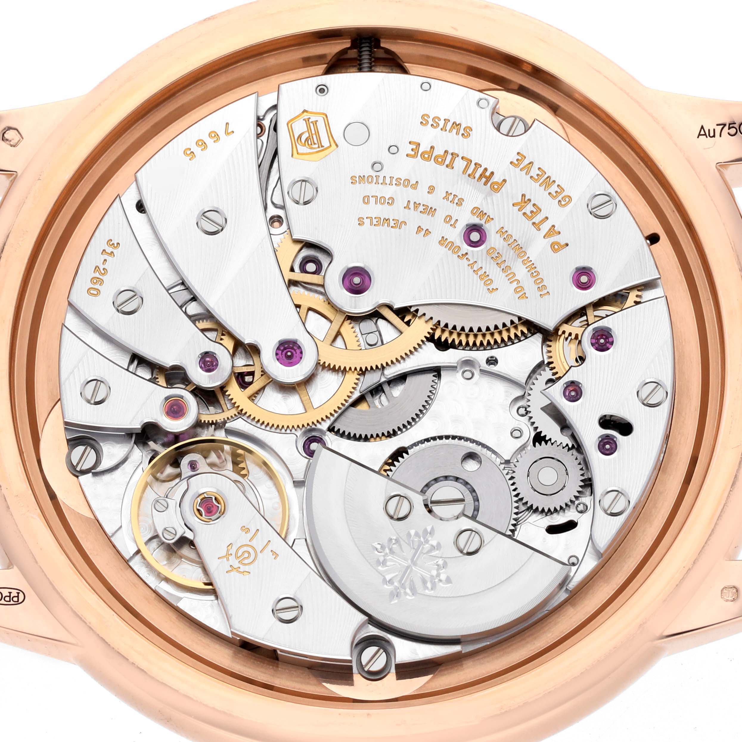 The image shows the intricate movement and inner workings of a Patek Philippe Calatrava 5224R-001 Men's Rose Gold Blue Dial 5224R-001 Men's Rose Gold Blue Dial watch from a back angle.