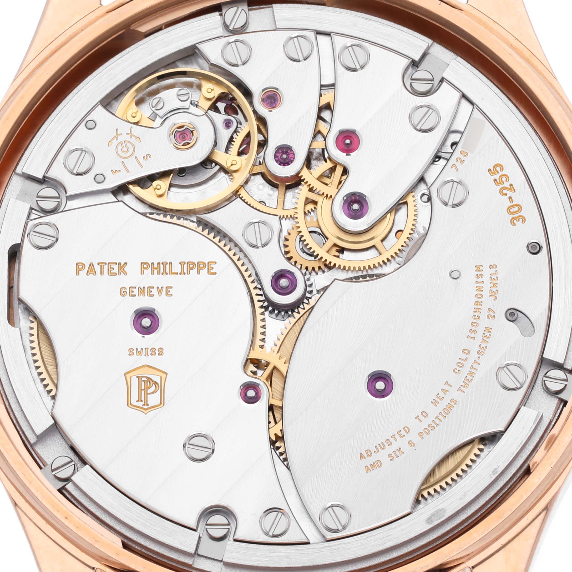 The image shows the back view of a Patek Philippe Calatrava 6119R-001 Men's Rose Gold Silver Dial 6119R-001 Men's Rose Gold Silver Dial, revealing its intricate movement and internal components.
