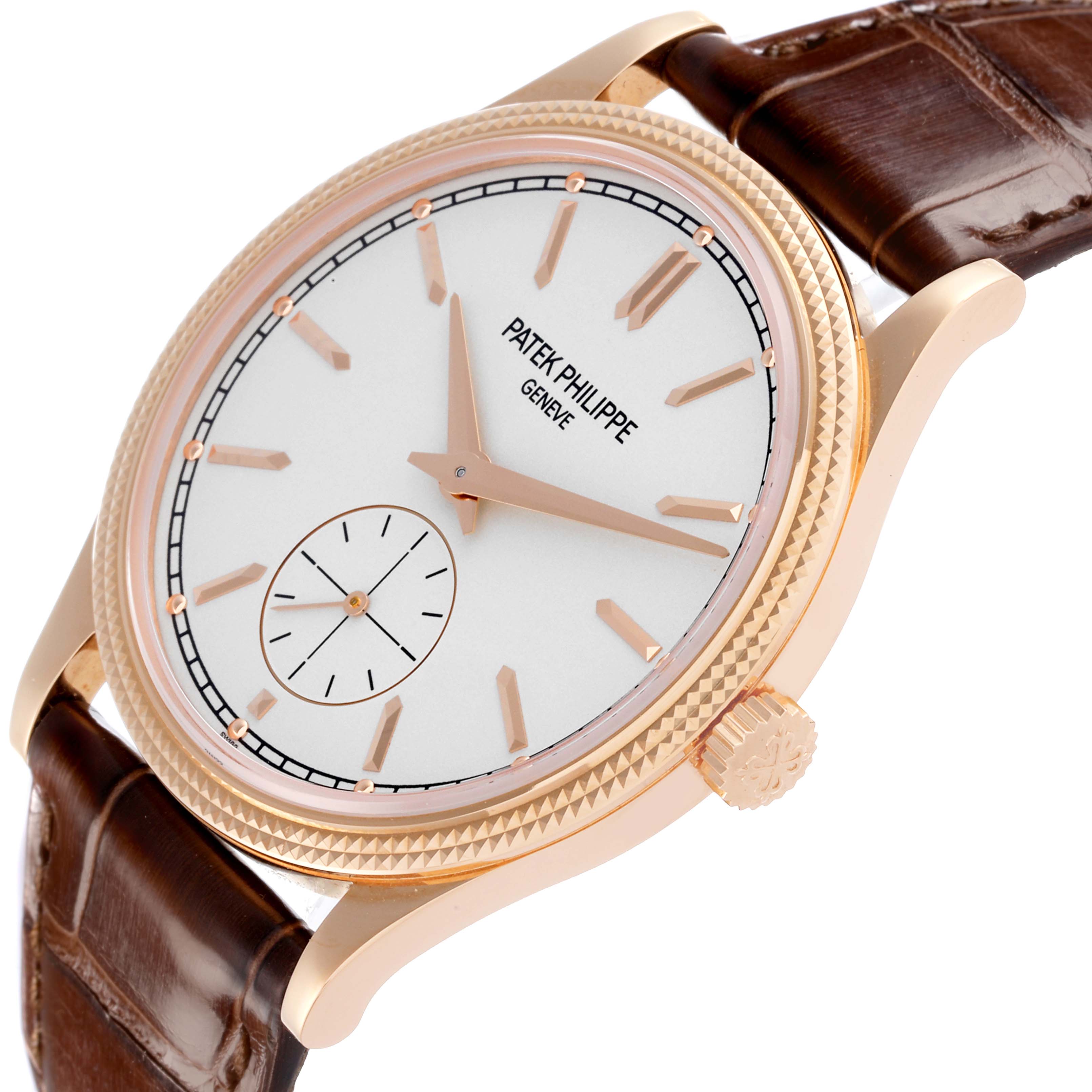 The Patek Philippe Calatrava 6119R-001 Men's Rose Gold Silver Dial 6119R-001 Men's Rose Gold Silver Dial watch is shown at a slight angle, displaying its face, crown, and leather strap.