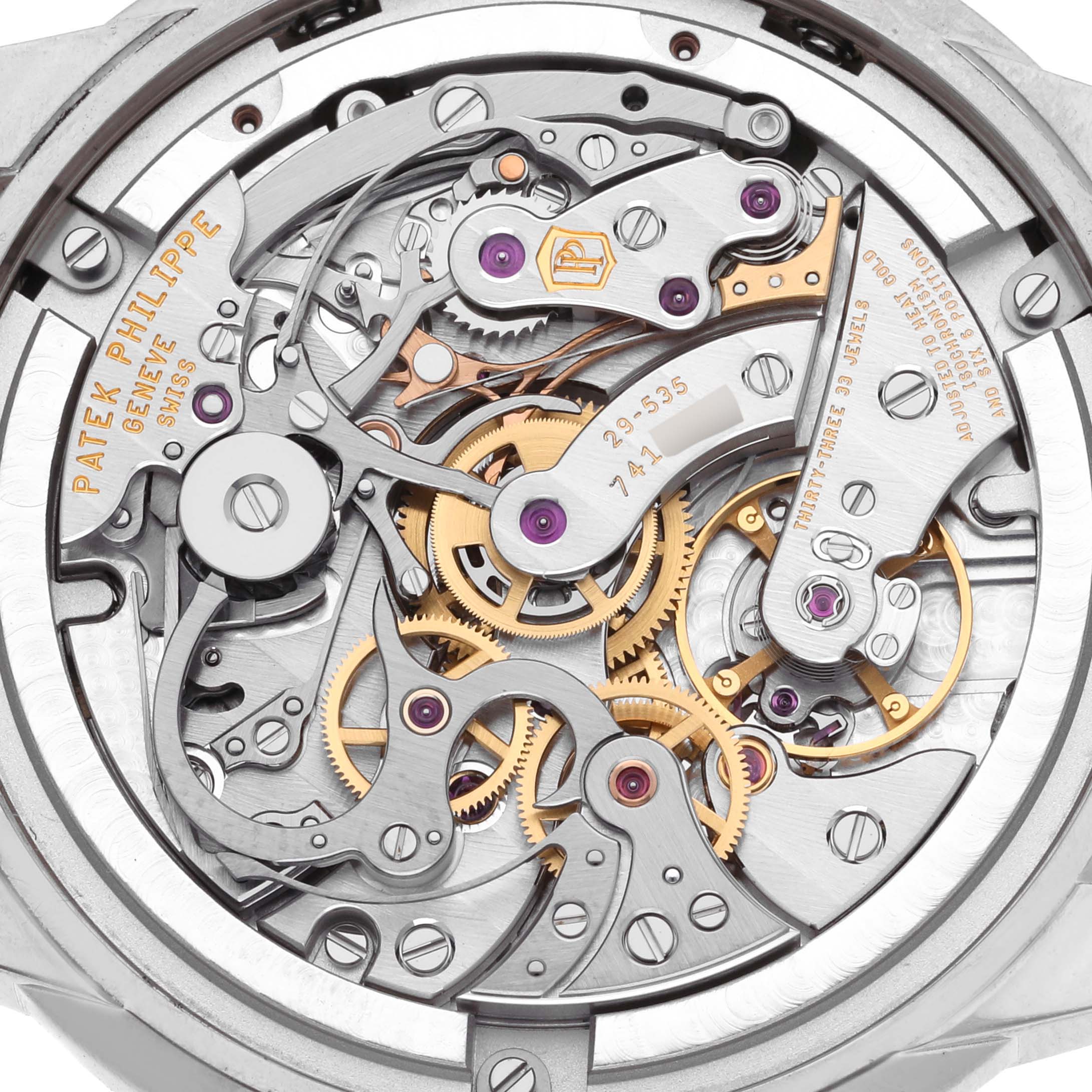 The image shows a close-up of the movement components of a Patek Philippe Complications 5172G-001 Men's White Gold Blue Dial 5172G-001 Men's White Gold Blue Dial watch from the back.