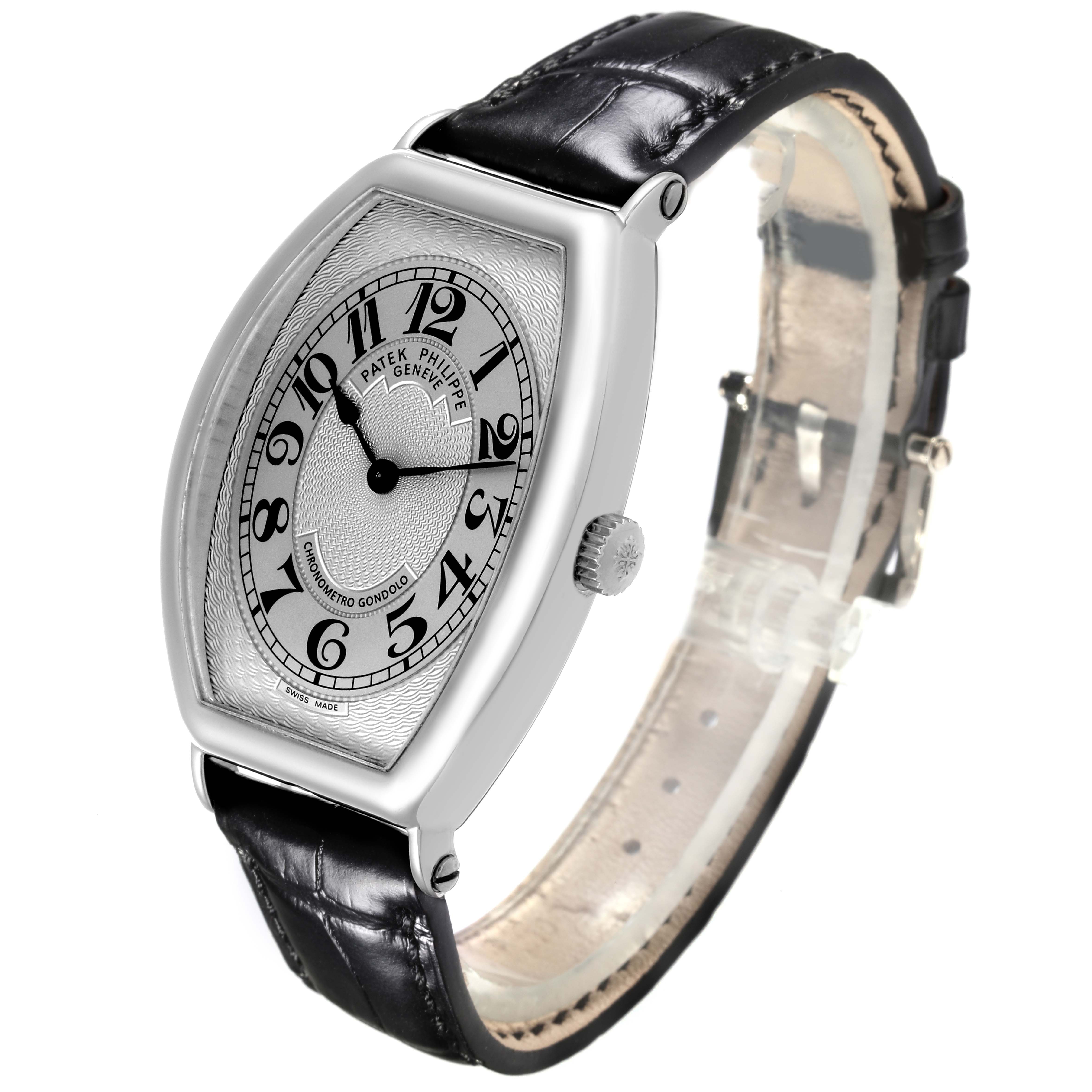 The Patek Philippe Gondolo 5098P-001 Men's Platinum Silver Dial 5098P-001 Men's Platinum Silver Dial watch is shown from a slightly angled perspective, displaying its face, case, crown, and strap clearly.