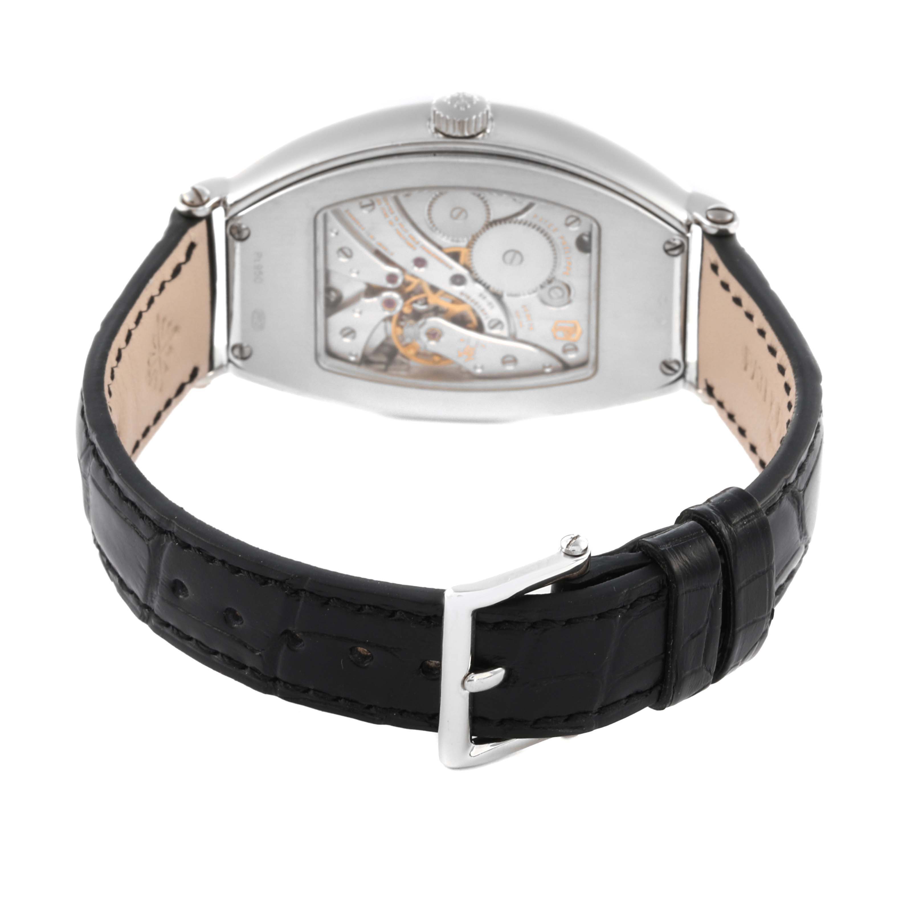 The Patek Philippe Gondolo 5098P-001 Men's Platinum Silver Dial 5098P-001 Men's Platinum Silver Dial watch is shown from the back, highlighting its movement and black leather strap with buckle.