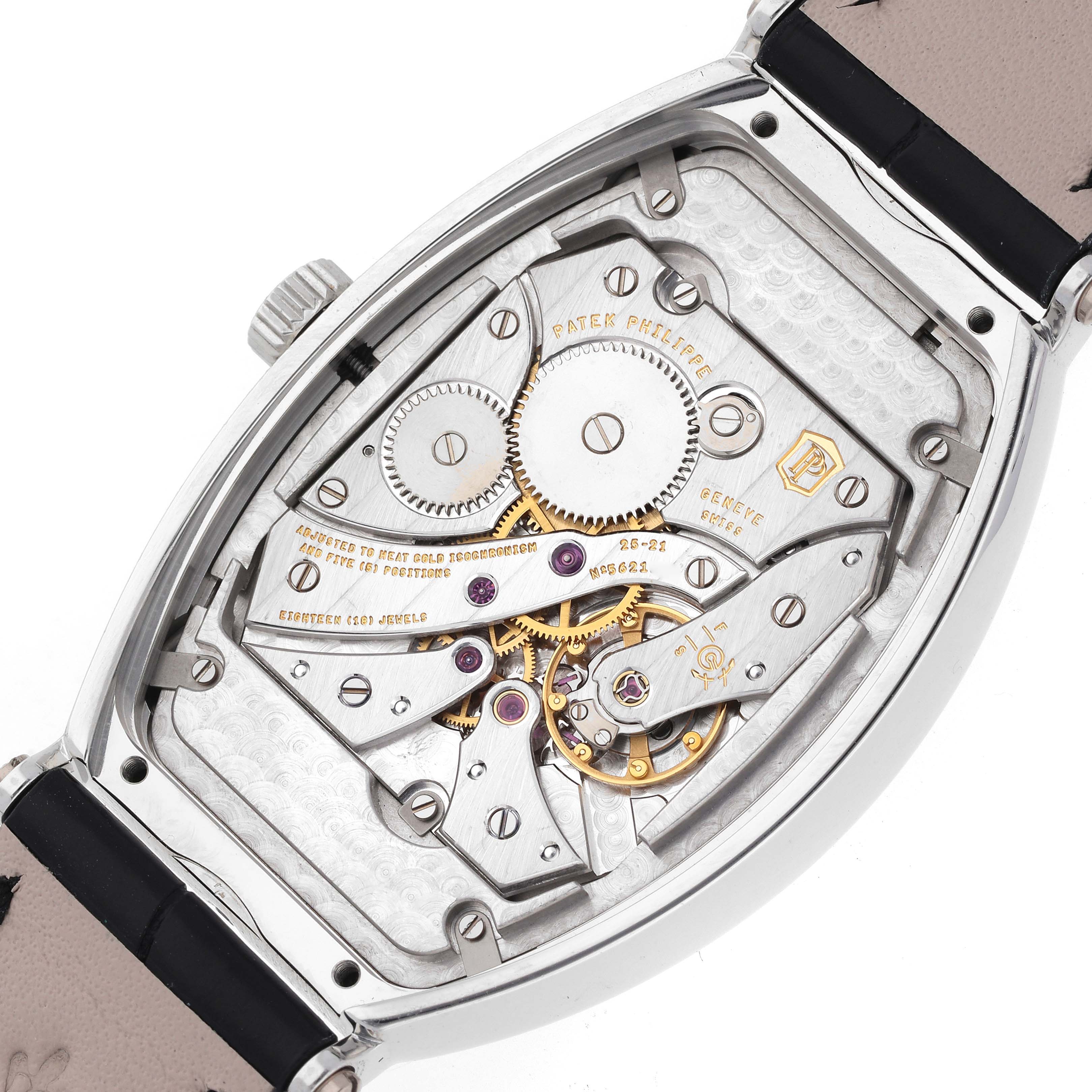 The image shows the back view of a Patek Philippe Gondolo 5098P-001 Men's Platinum Silver Dial 5098P-001 Men's Platinum Silver Dial watch, highlighting its mechanical movement.