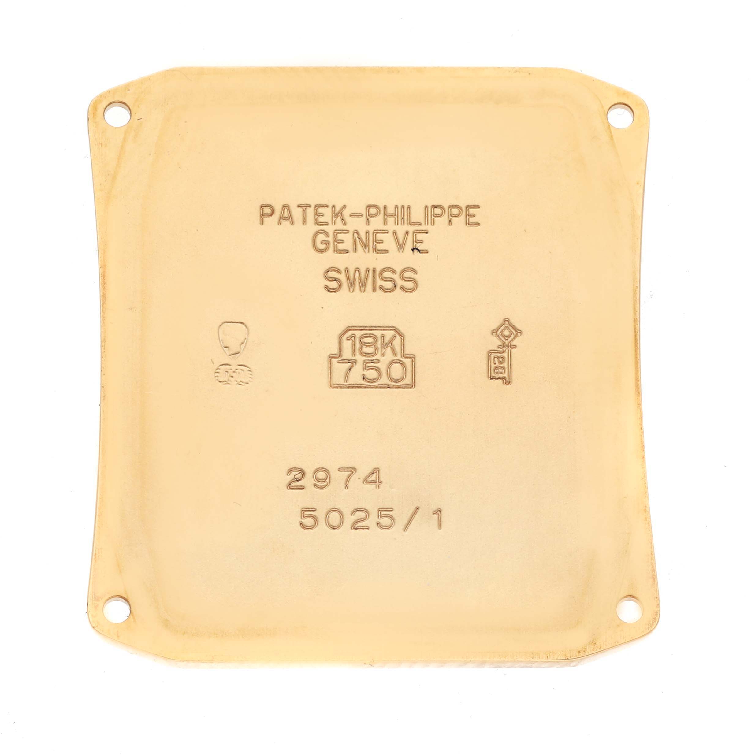 The image shows the case back of a Patek Philippe Gondolo 5025/1J Men's Yellow Gold White Dial 5025/1J Men's Yellow Gold White Dial watch, detailing engravings and hallmarks.