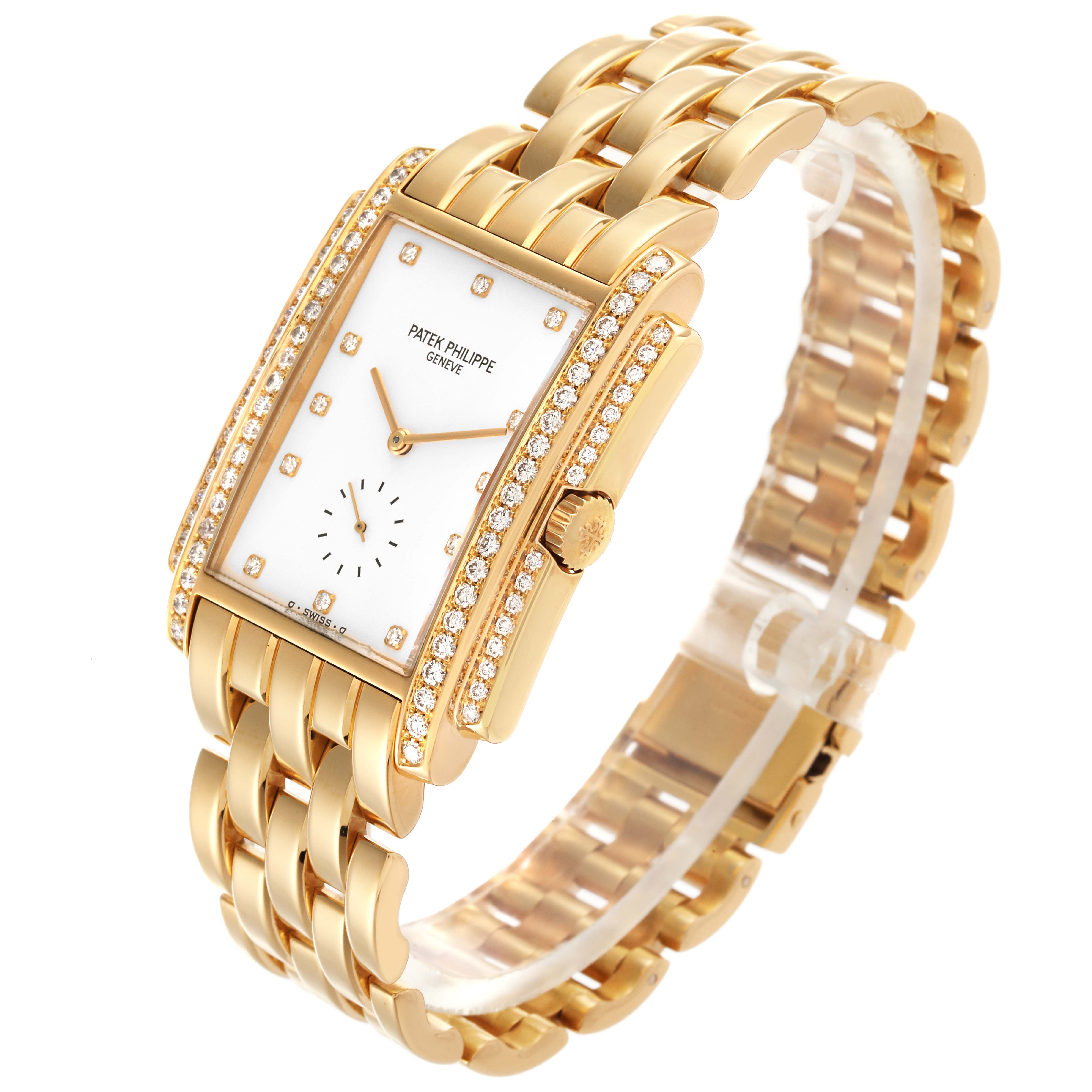 The Patek Philippe Gondolo 5025/1J Men's Yellow Gold White Dial 5025/1J Men's Yellow Gold White Dial watch is shown at a three-quarter angle, displaying the gold bracelet, rectangular case, and diamond details.