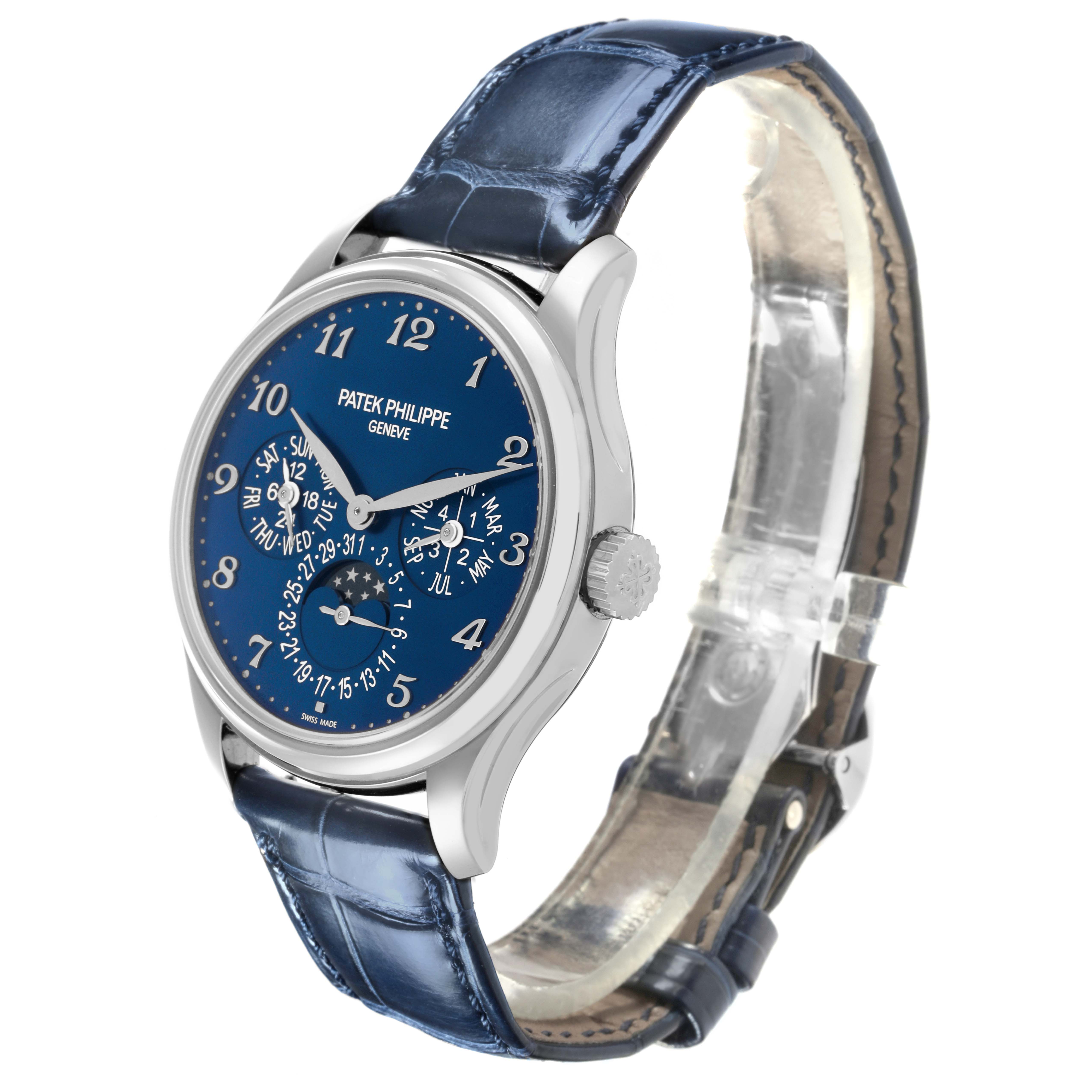 The Patek Philippe Complications 5327G-001 Men's White Gold Blue Dial 5327G-001 Men's White Gold Blue Dial watch is shown at a slight angle, featuring the dial, case, crown, and part of the strap.