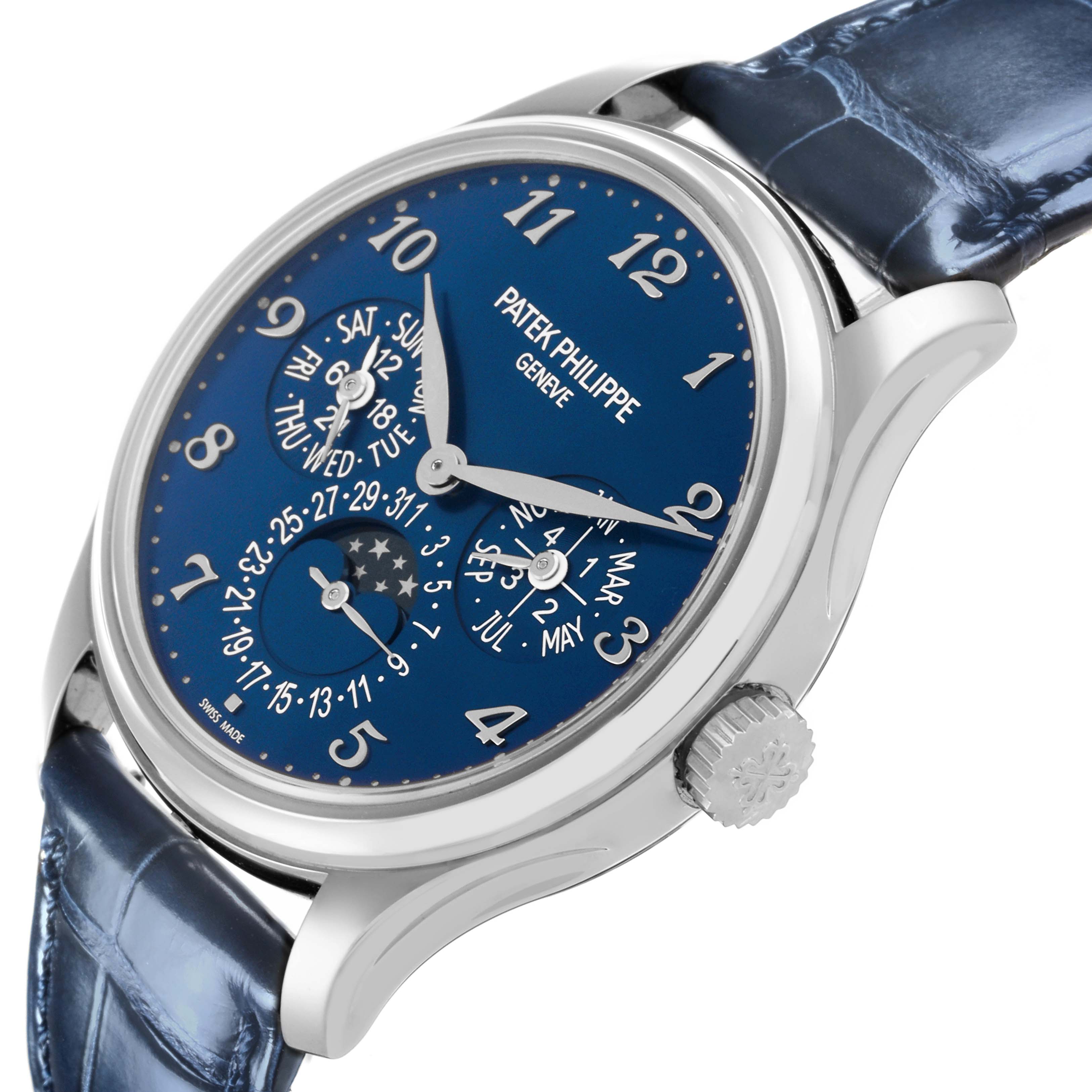 The Patek Philippe Complications 5327G-001 Men's White Gold Blue Dial 5327G-001 Men's White Gold Blue Dial watch is shown at a slight side angle, highlighting the face, crown, and strap.