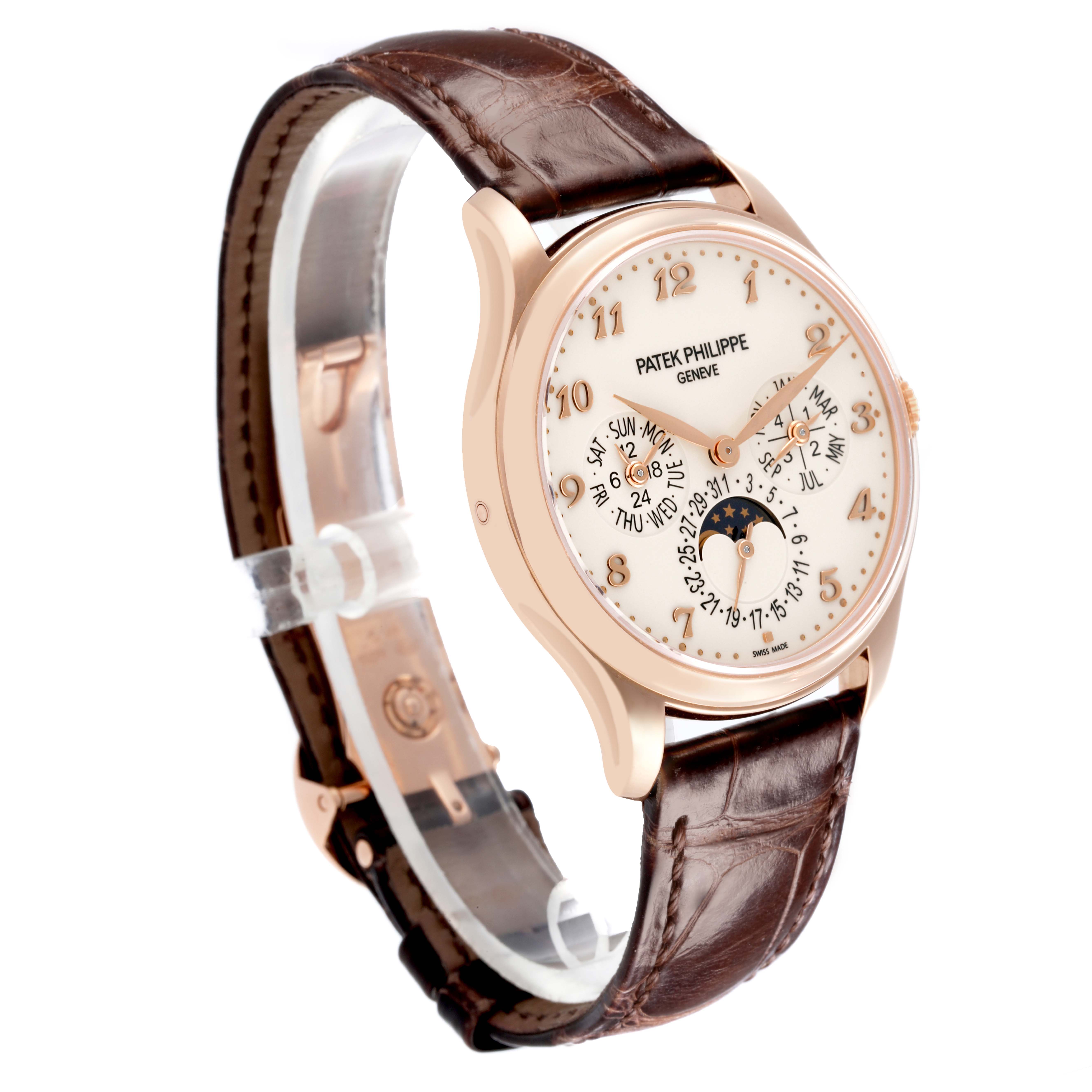 The Patek Philippe Complications 5327R-001 Men's Rose Gold White Dial 5327R-001 Men's Rose Gold White Dial watch is shown at a three-quarter angle, displaying the face, case, and part of the strap.