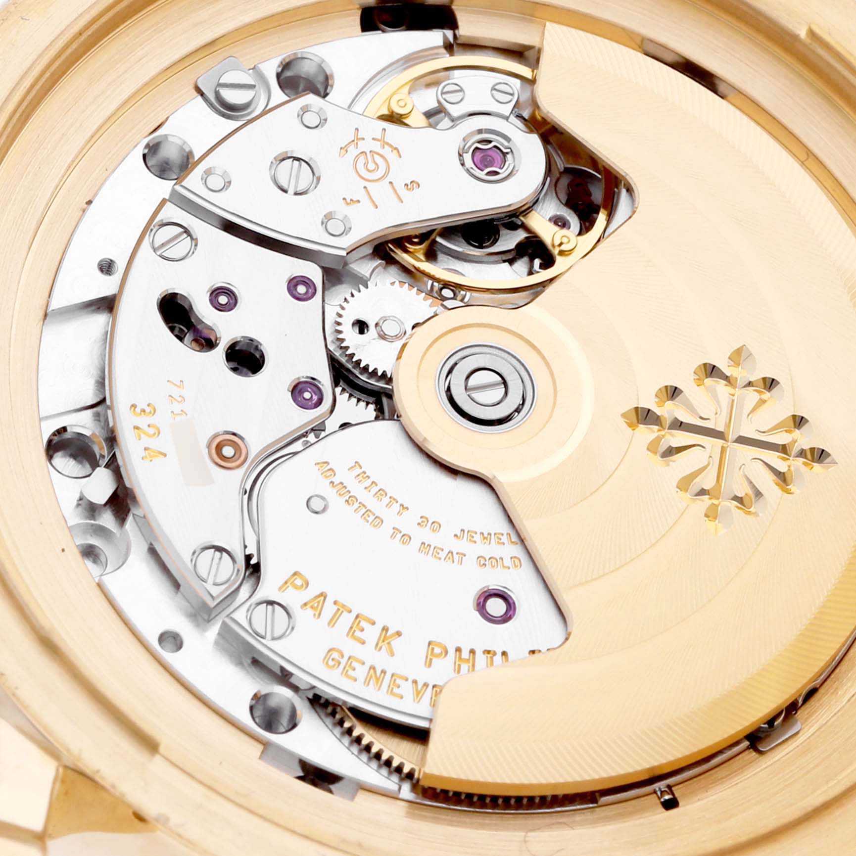 The image shows the intricate movement mechanism of the Patek Philippe Complications 5159J Men's Yellow Gold Silver Dial 5159J Men's Yellow Gold Silver Dial watch from a close-up angle.