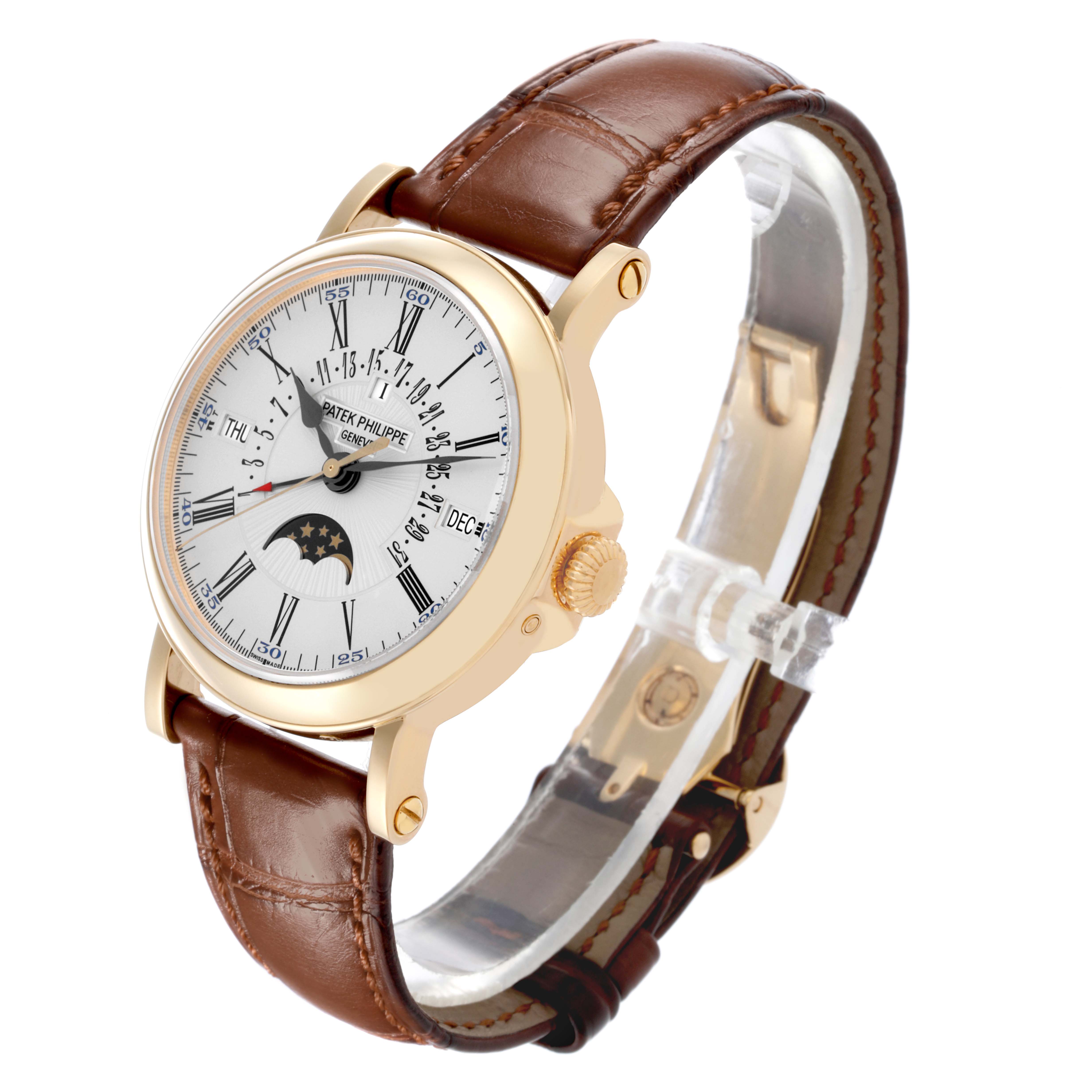 The image shows a Patek Philippe Complications 5159J Men's Yellow Gold Silver Dial 5159J Men's Yellow Gold Silver Dial watch at an angled side view, highlighting the case, face, and brown leather strap.