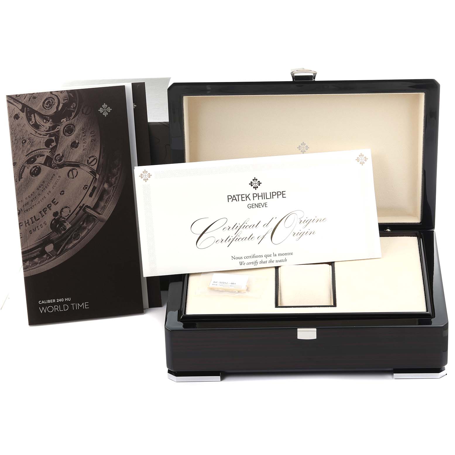 The image shows the Patek Philippe Complications 5231J-001 Men's Yellow Gold Silver Dial 5231J-001 Men's Yellow Gold Silver Dial watch box, certificate, and a brochure from a frontal angle.