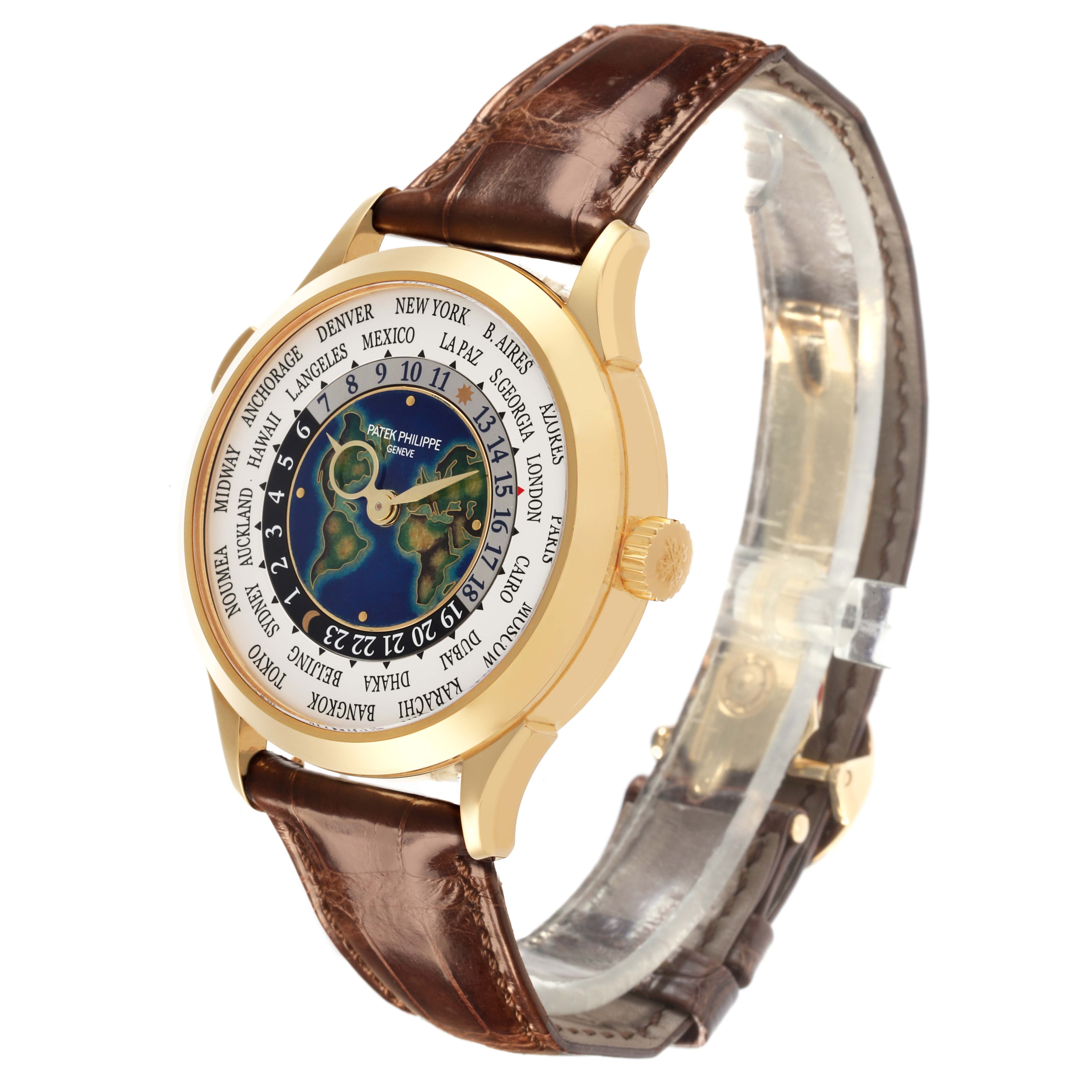 The Patek Philippe Complications 5231J-001 Men's Yellow Gold Silver Dial 5231J-001 Men's Yellow Gold Silver Dial watch is shown from a three-quarter angle, highlighting its face and brown leather strap.