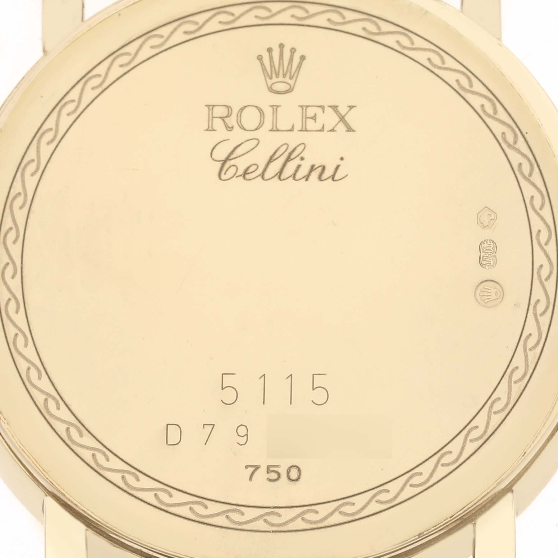 The image shows the back case of a Rolex Cellini 5115 Men's Yellow Gold Silver Dial 5115 Men's Yellow Gold Silver Dial watch, focusing on the engravings and hallmarks.