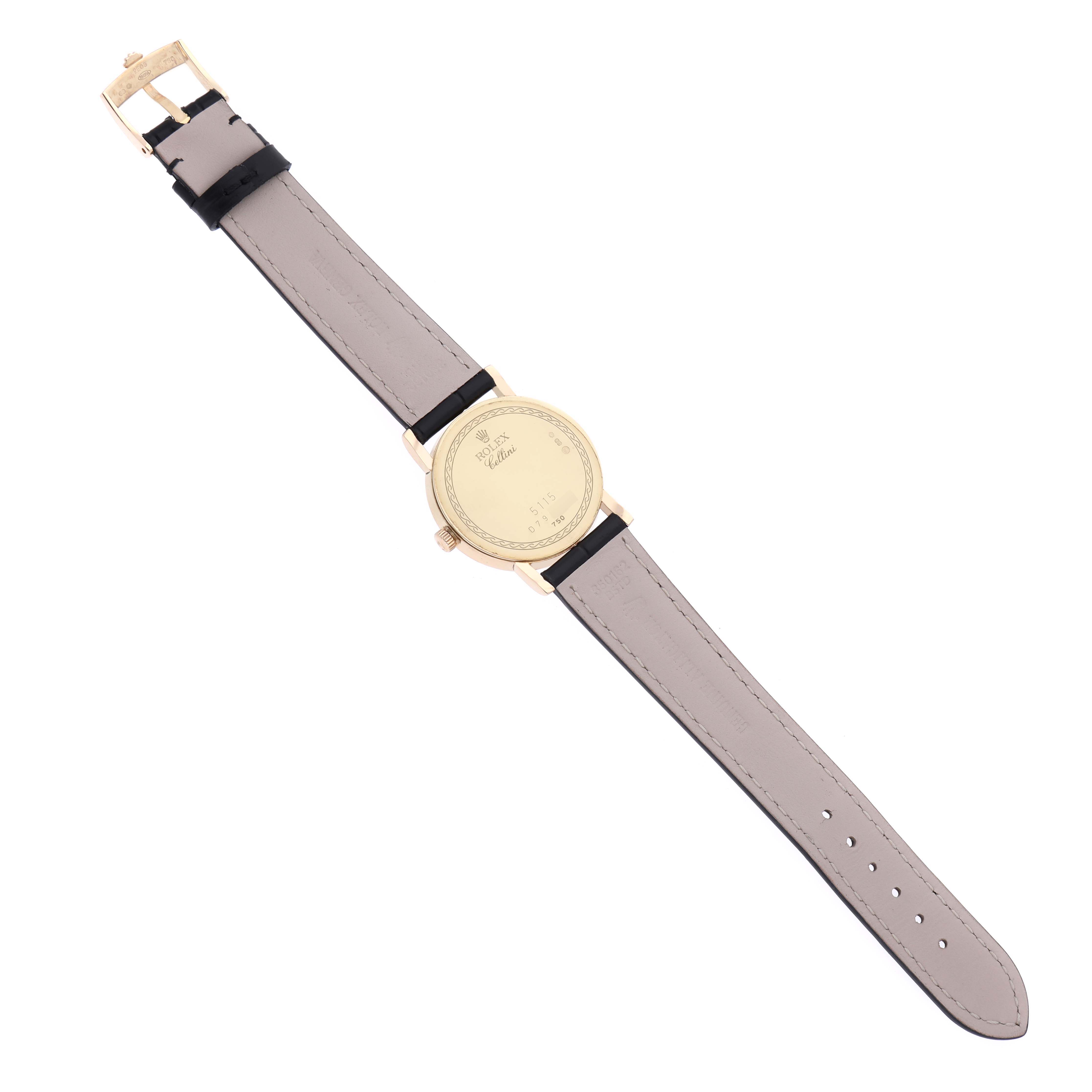 The image shows the back of the Rolex Cellini 5115 Men's Yellow Gold Silver Dial 5115 Men's Yellow Gold Silver Dial watch from a top-down angle, including the strap and buckle.