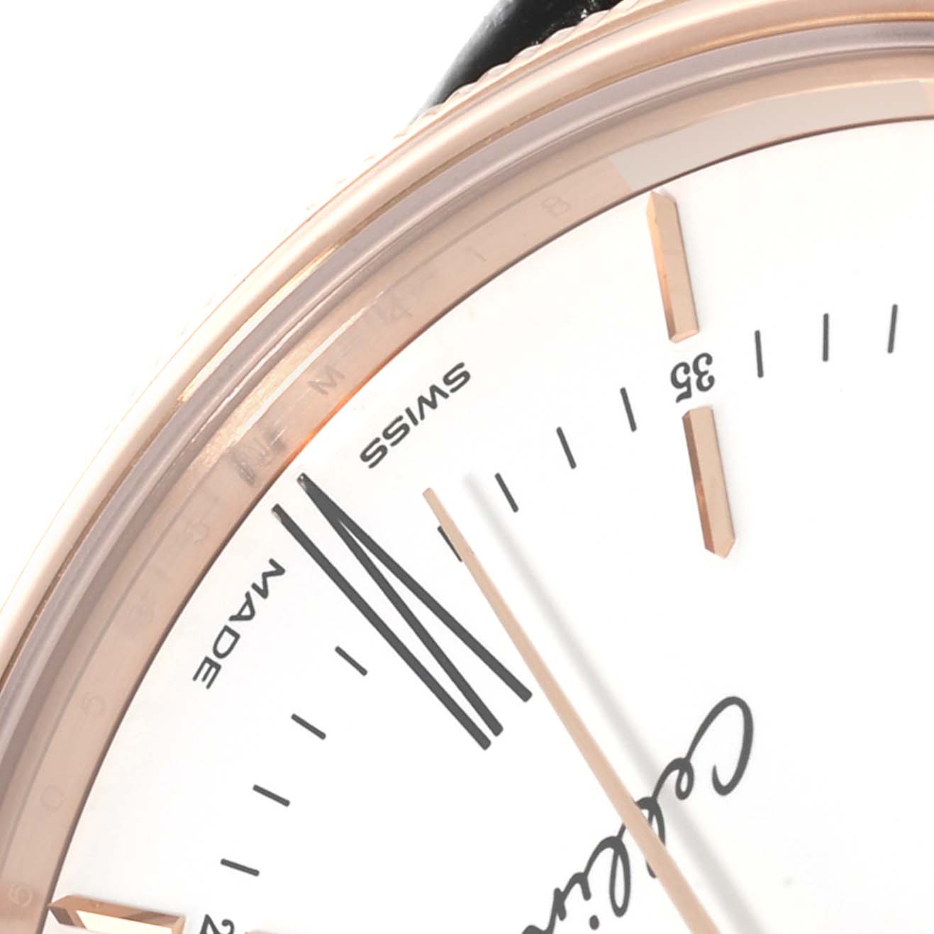The image shows a close-up of the dial of a Rolex Cellini 50505 Men's Rose Gold White Dial 50505 Men's Rose Gold White Dial watch, focusing on the index markers and part of the hands.