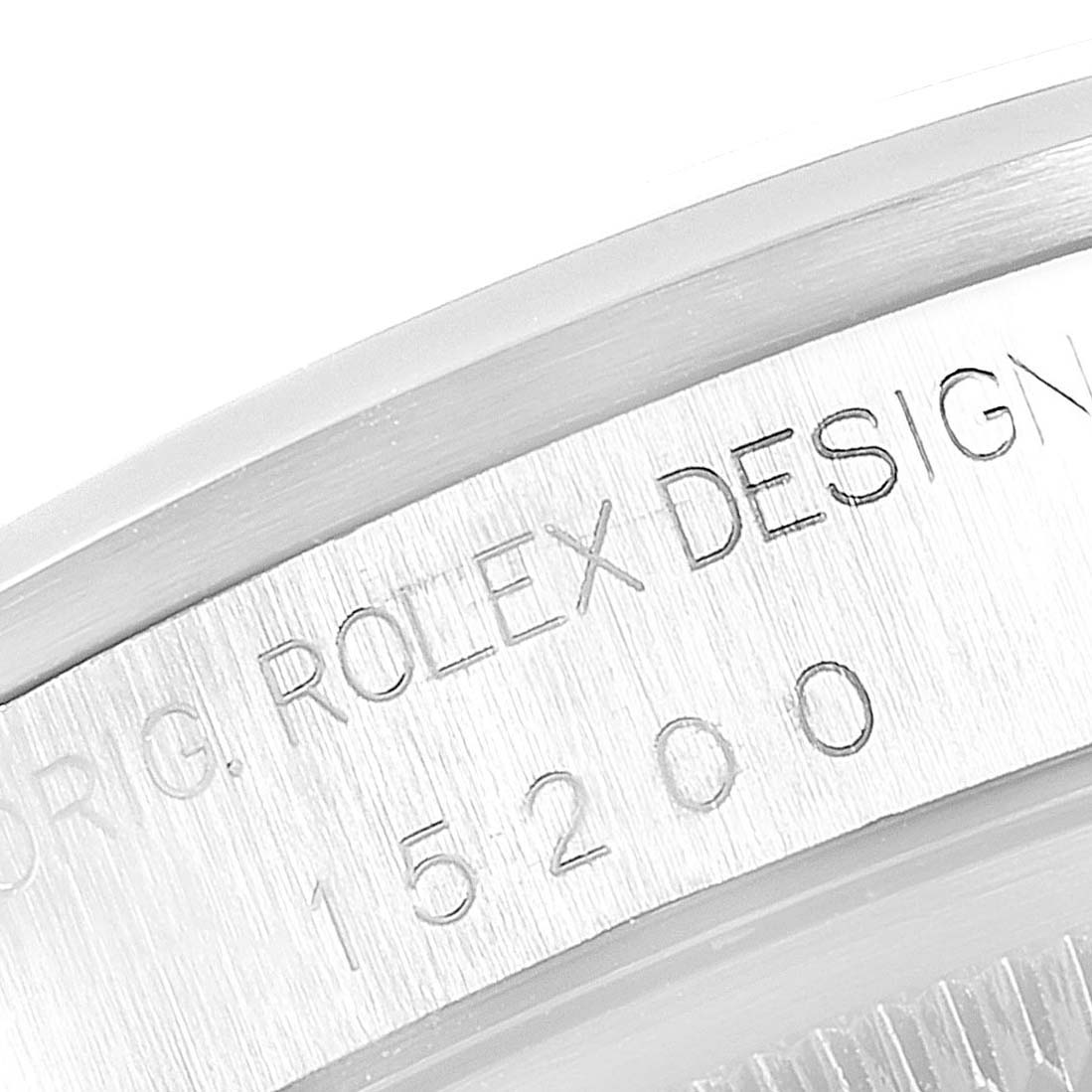 This image shows a close-up of the engraved side portion of a Rolex Date 15200 Men's Stainless Steel White Dial 15200 Men's Stainless Steel White Dial model watch, featuring its serial number.