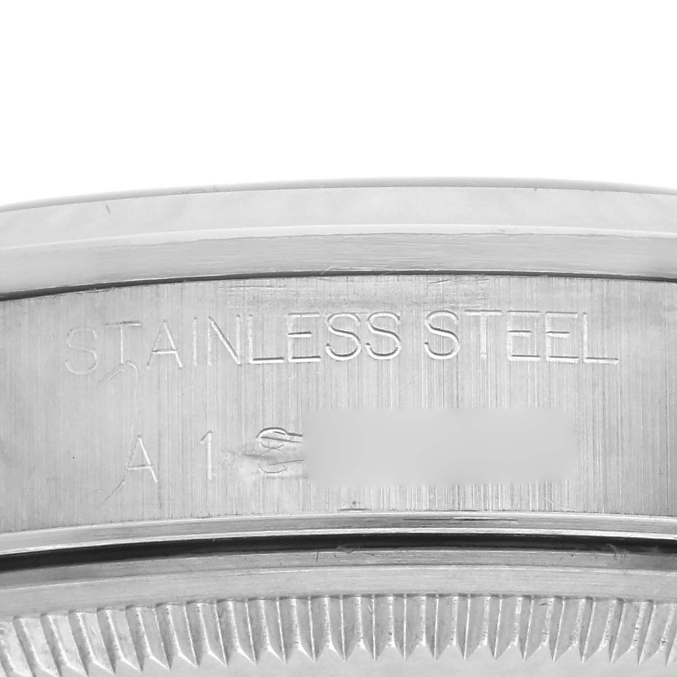 The image shows a close-up of the side detail on a Rolex Date 15200 Men
s Stainless Steel Pink Dial 15200 Men
s Stainless Steel Pink Dial model, highlighting the stainless steel engraving.