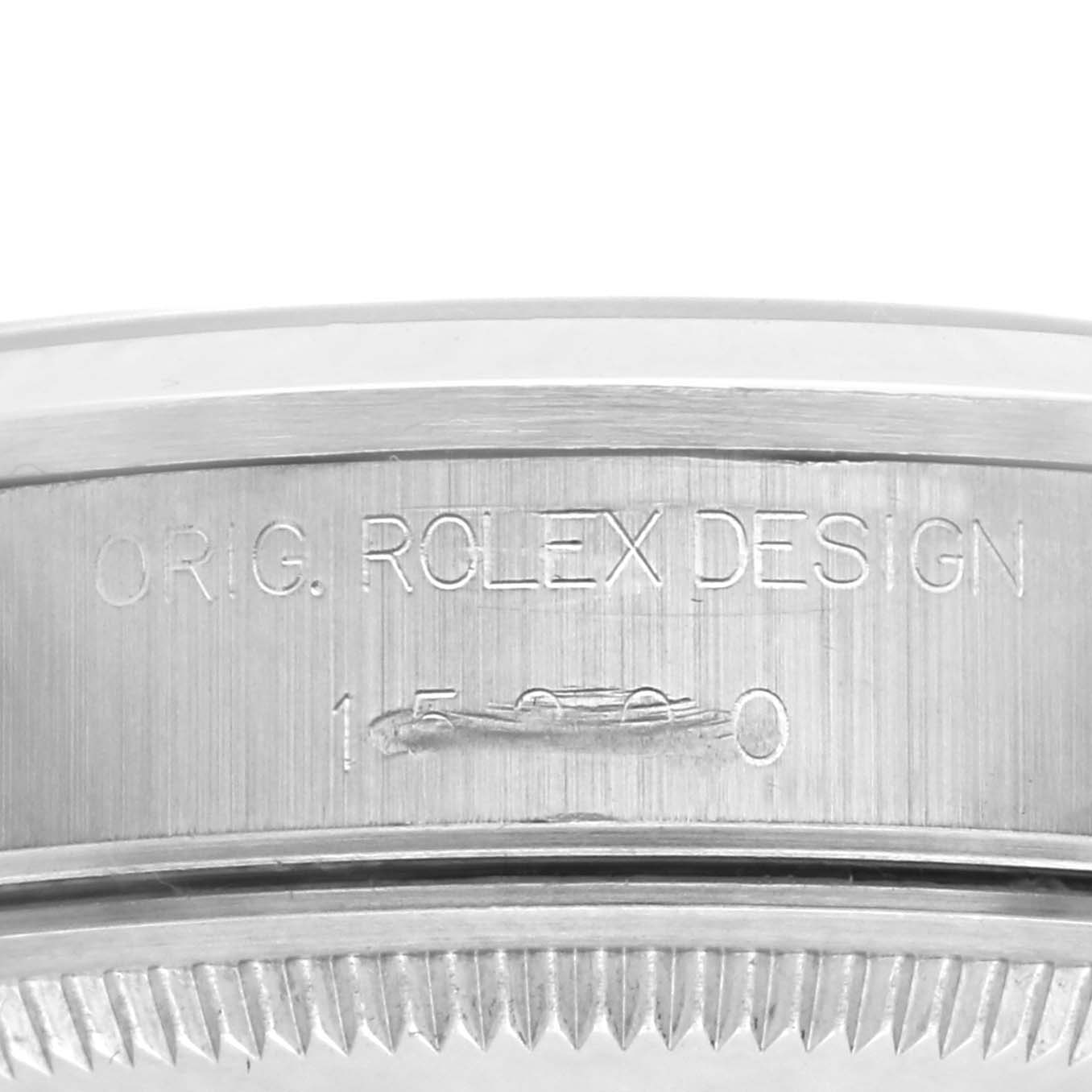 The image shows a close-up of the side of a Rolex Date 15200 Men
s Stainless Steel Pink Dial 15200 Men
s Stainless Steel Pink Dial model watch, highlighting the engraved design number.