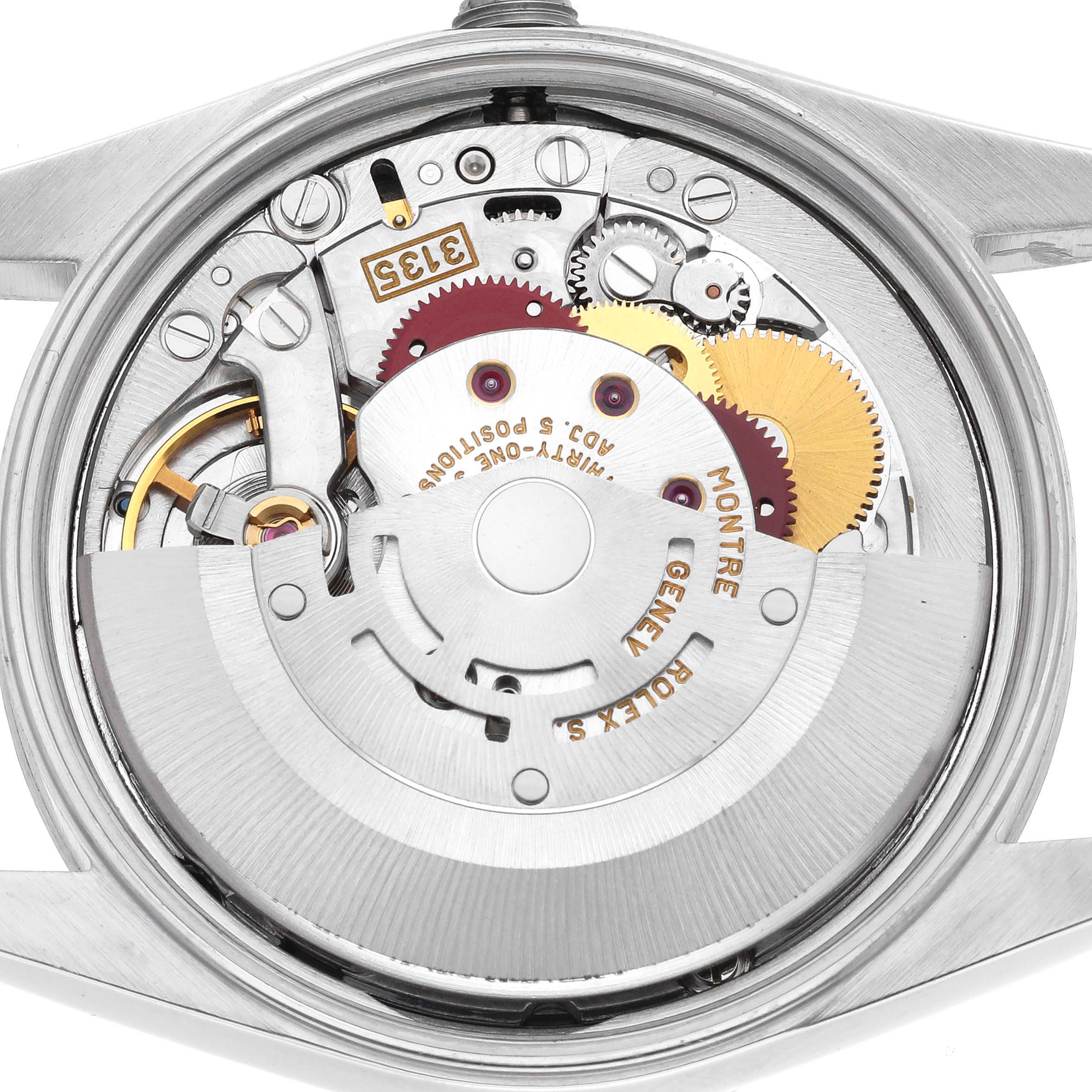 The image shows the movement and inner mechanics of a Rolex Date 15200 Men
s Stainless Steel Pink Dial 15200 Men
s Stainless Steel Pink Dial watch from the back.