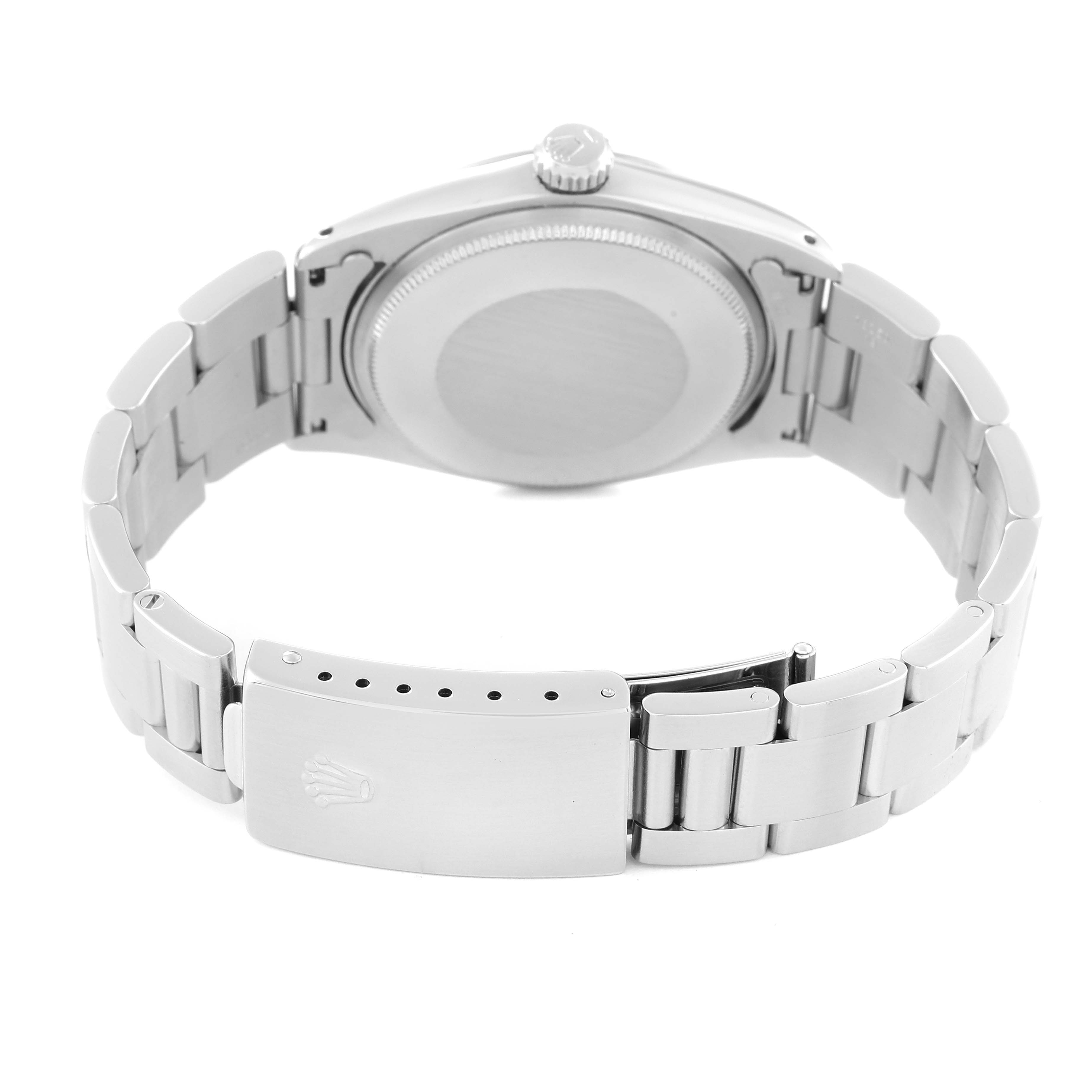 The Rolex Vintage Collection 1500 Men's Stainless Steel Black Dial 1500 Men's Stainless Steel Black Dial model is shown from the back, highlighting the case back and metal bracelet with clasp.