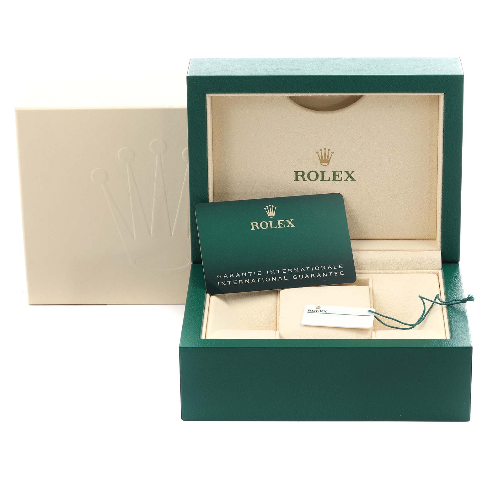 The image shows an open Rolex box set with an international guarantee card and a tag, showcasing the Mid-Size model packaging.