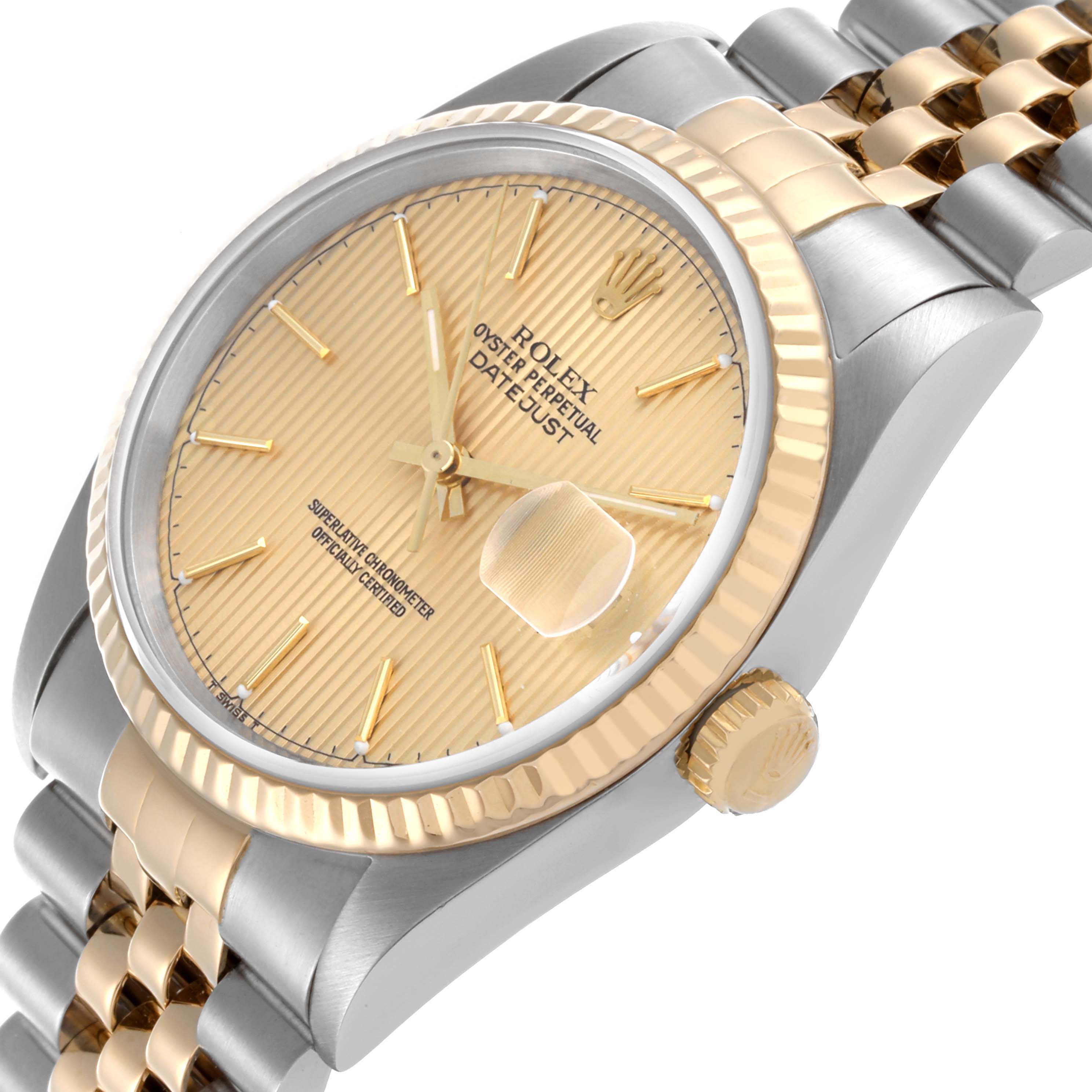 The Rolex Datejust 16233 Men's Steel and Gold (two tone) Champagne Dial 16233 Men's Steel and Gold (two tone) Champagne Dial watch is shown at a slightly angled view, featuring the face, bezel, crown, and part of the bracelet.