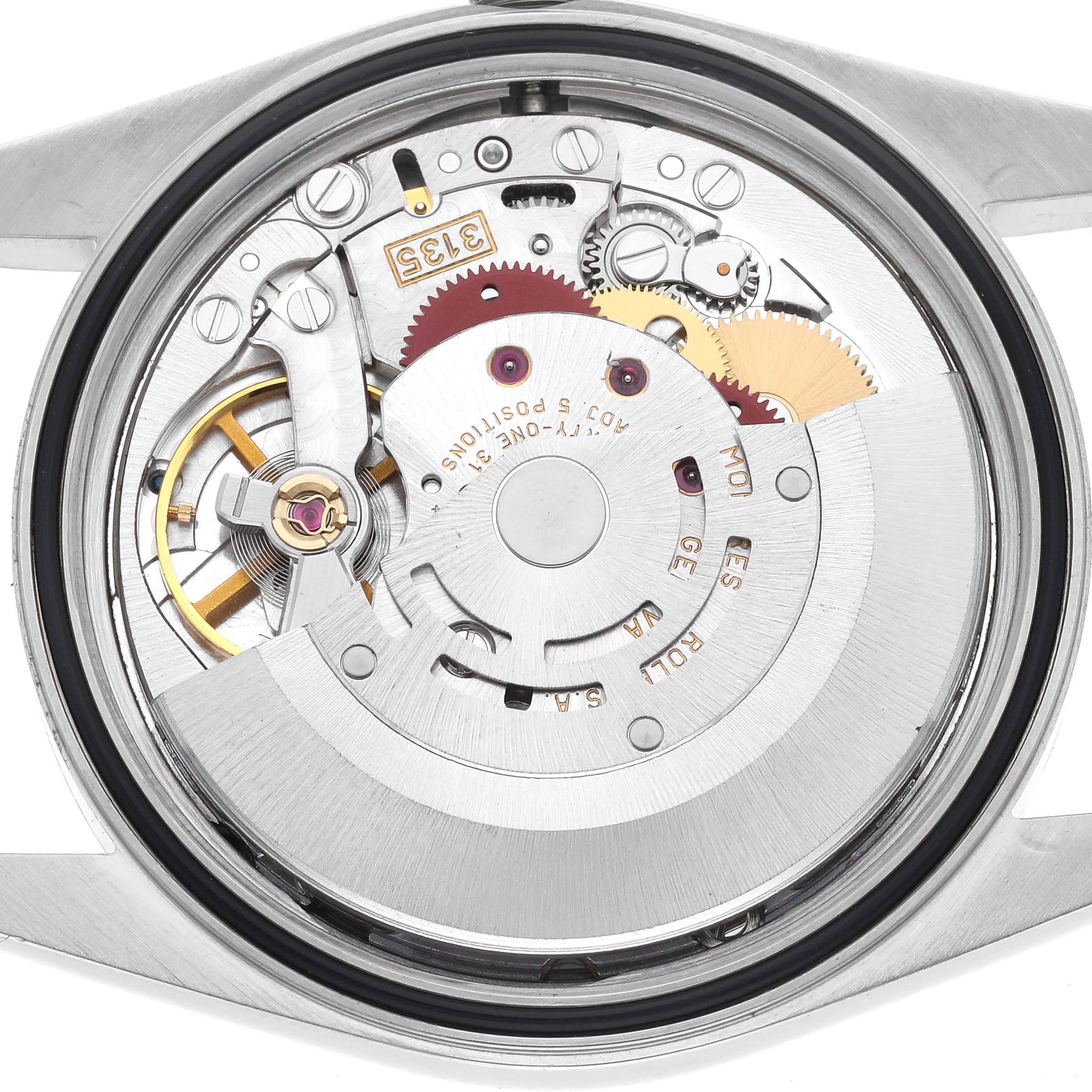 The image shows a rear view of the Rolex Datejust 16200 Men's Stainless Steel Silver Dial 16200 Men's Stainless Steel Silver Dial watch, highlighting its intricate movement mechanism.