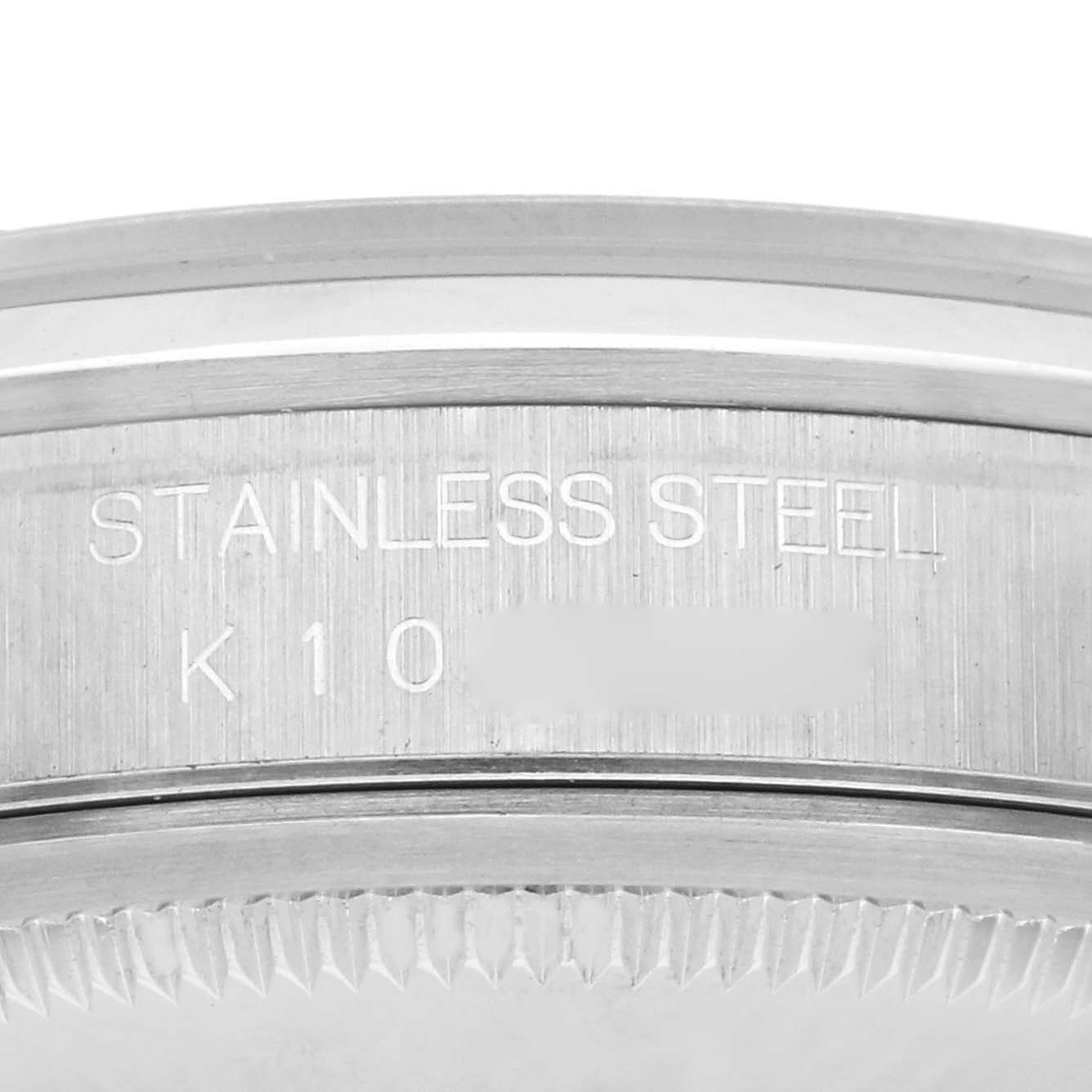 The image shows a close-up of the stainless steel case side and serrated bezel of a Rolex Datejust 16200 Men's Stainless Steel Silver Dial 16200 Men's Stainless Steel Silver Dial watch.