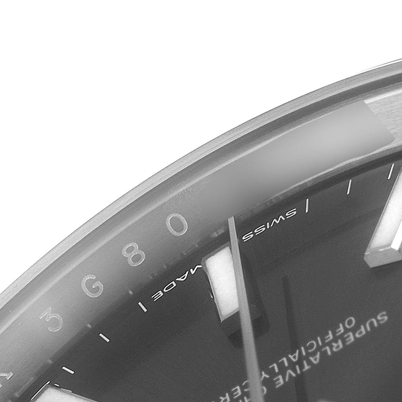 The angle shows a close-up of the dial and bezel of the Rolex Datejust 41 126300 Men's Stainless Steel Grey Dial 126300 Men's Stainless Steel Grey Dial, revealing parts of the hour markers and text.