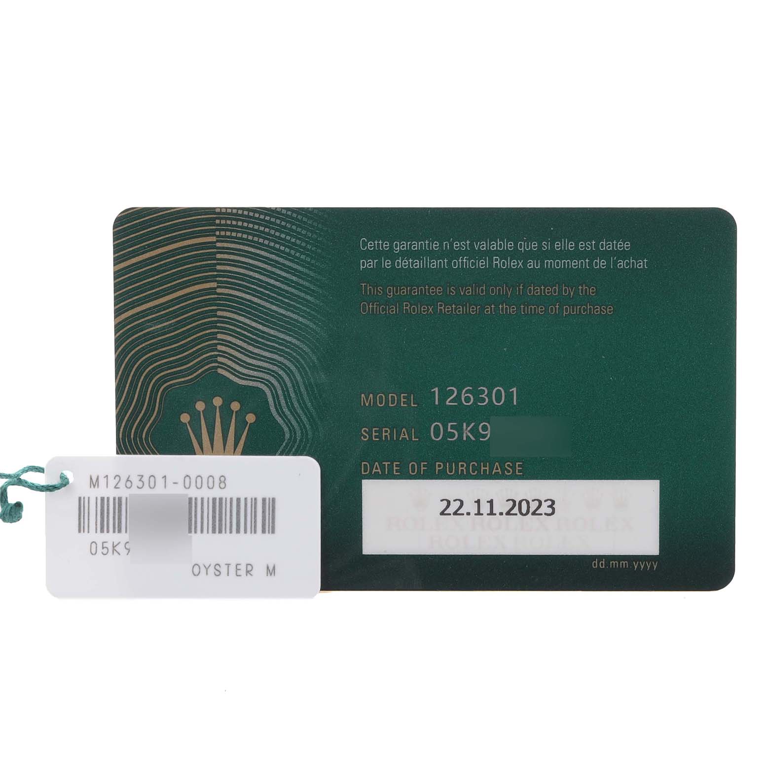 This image shows the warranty card and tag for the Rolex Datejust 41 126301 Men's Steel and Gold (two tone) Pink Dial 126301 Men's Steel and Gold (two tone) Pink Dial model.