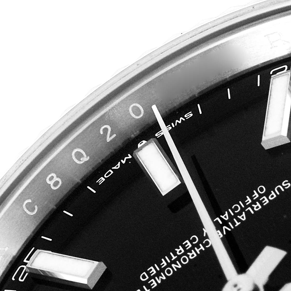 The image shows a close-up view of the dial and bezel of a Rolex Datejust 41 126334 Men
s Stainless Steel Black Dial 126334 Men
s Stainless Steel Black Dial watch, highlighting the hour markers and part of the second hand.
