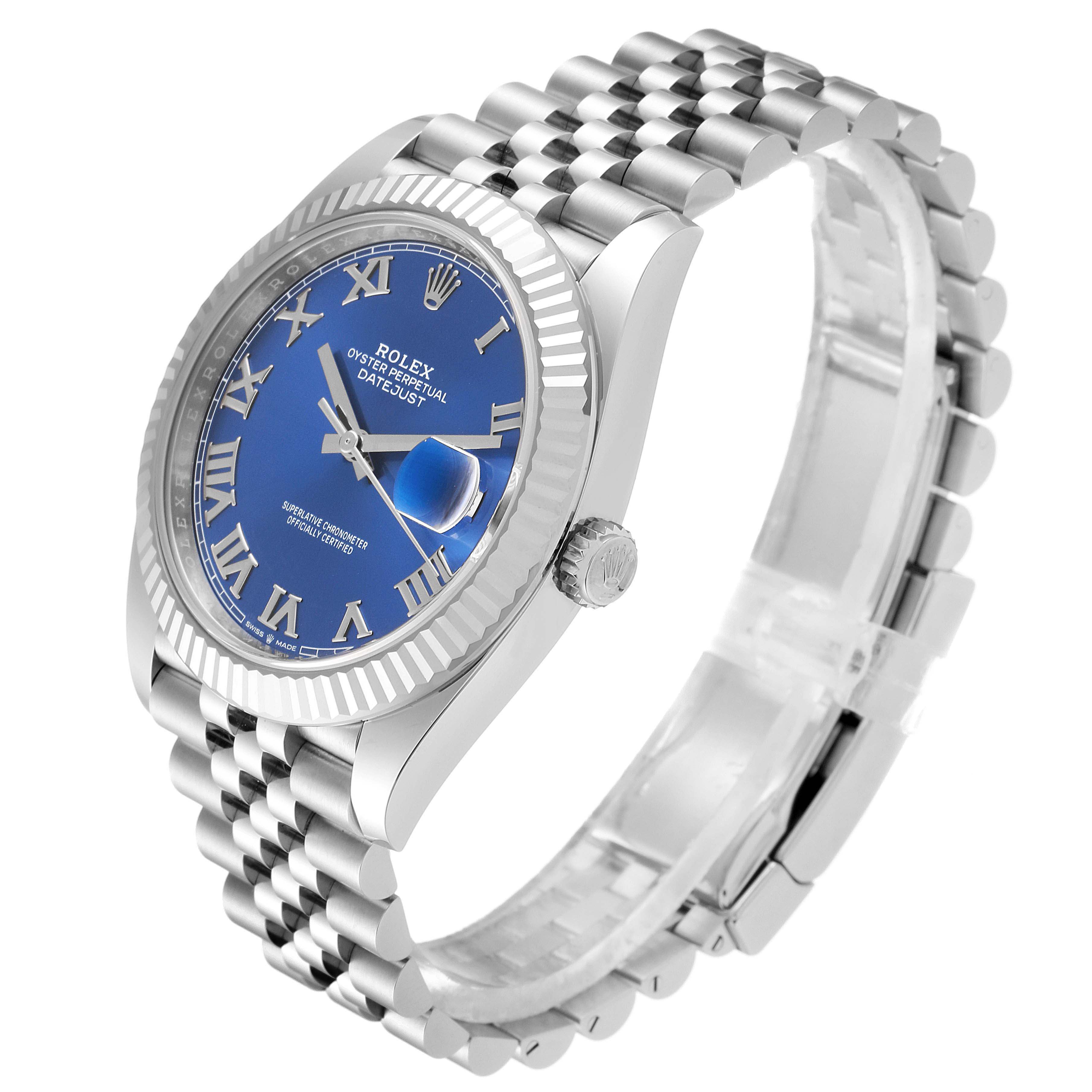 The Rolex Datejust 41 126334 Men
s Stainless Steel Blue Dial 126334 Men
s Stainless Steel Blue Dial model is shown at a slight three-quarter angle, displaying its blue dial, jubilee bracelet, and fluted bezel.