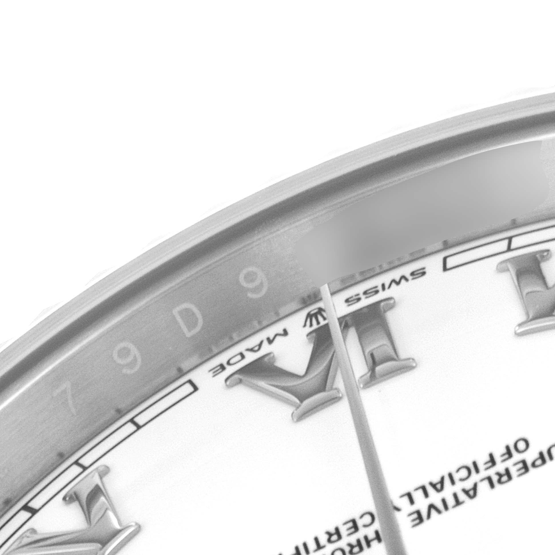 The image shows a close-up of the dial and Roman numeral hour markers on a Rolex Datejust 41 126334 Men
s Stainless Steel White Dial 126334 Men
s Stainless Steel White Dial watch.