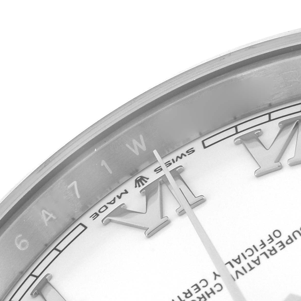 The image shows a close-up of the Rolex Datejust 41 126300 Men
s Stainless Steel White Dial 126300 Men
s Stainless Steel White Dial watch face, highlighting the Roman numerals and part of the minute hand.