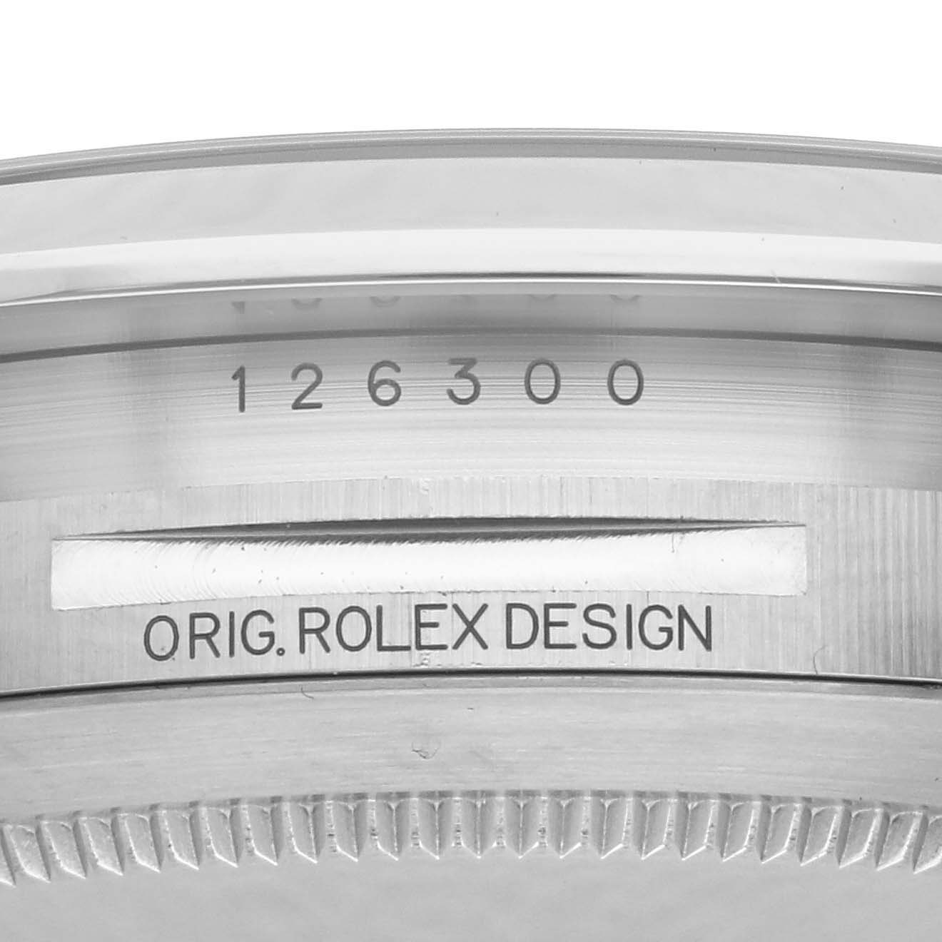 This image shows the inner case of a Rolex Datejust 41 126300 Men
s Stainless Steel White Dial 126300 Men
s Stainless Steel White Dial, focusing on the engraving and bezel detail.