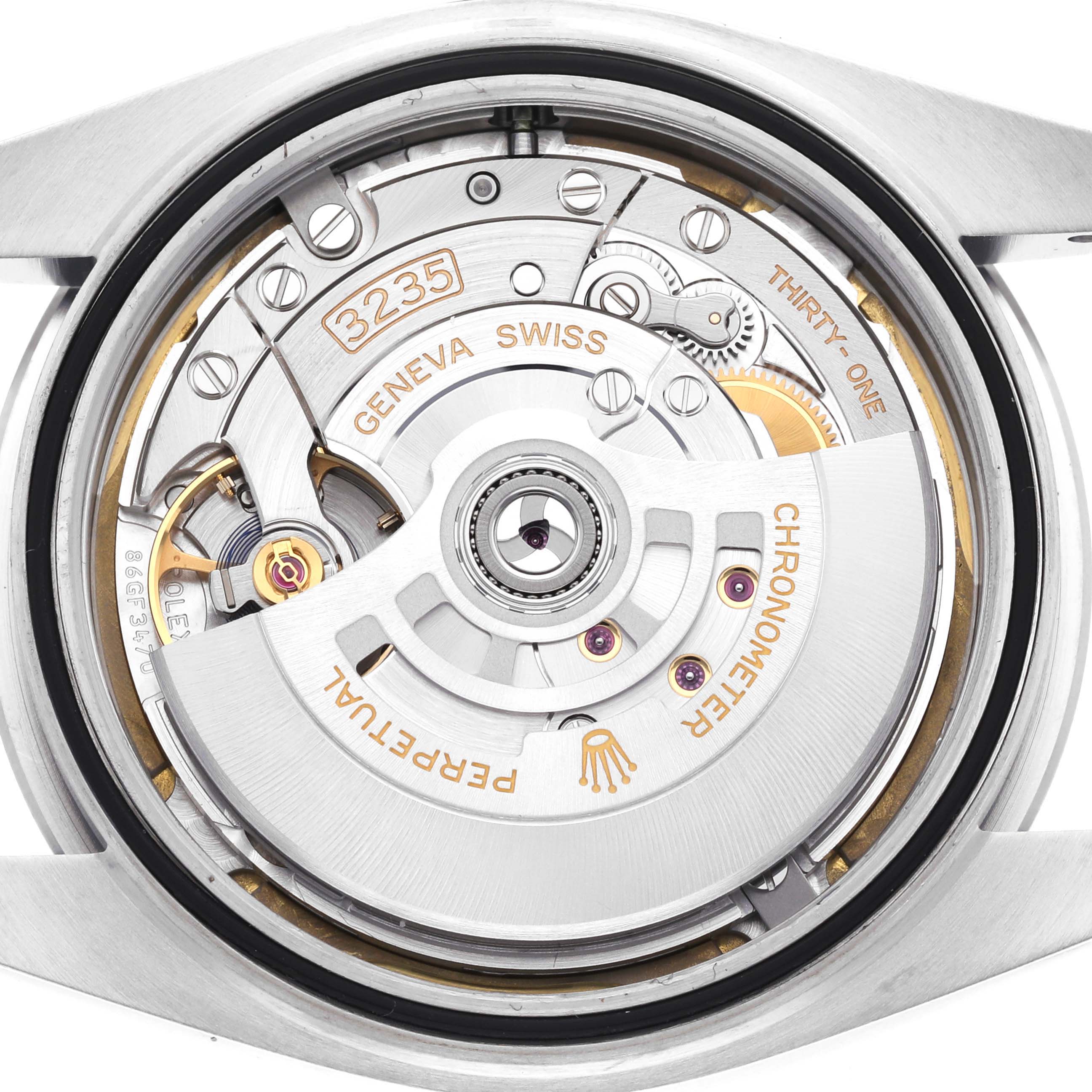 The image shows the back view of the Rolex Datejust 41 126300 Men
s Stainless Steel White Dial 126300 Men
s Stainless Steel White Dial, highlighting its caliber 3235 movement.