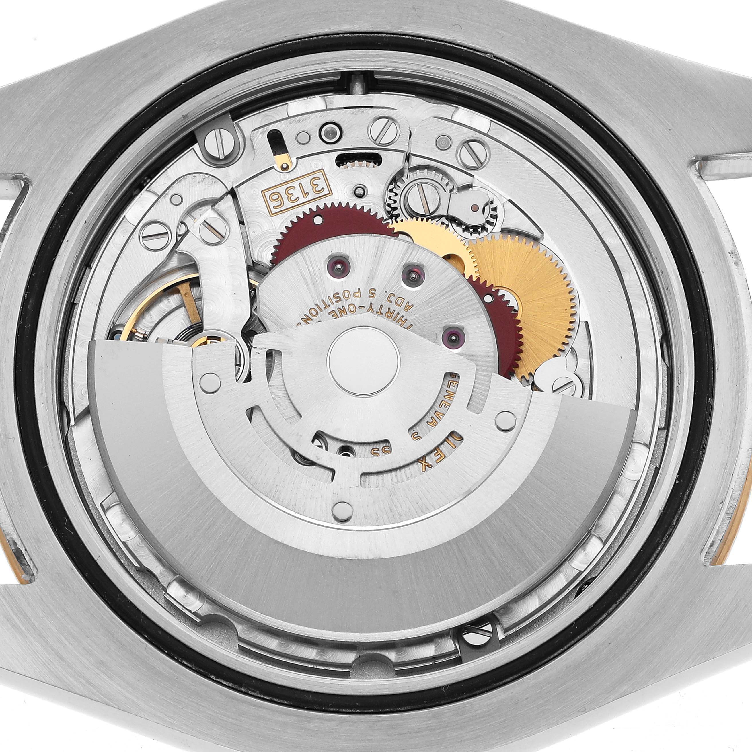 The image shows the back view of a Rolex Datejust 41 116333 Men's Steel and Gold (two tone) Champagne Dial, highlighting its intricate mechanical movement.