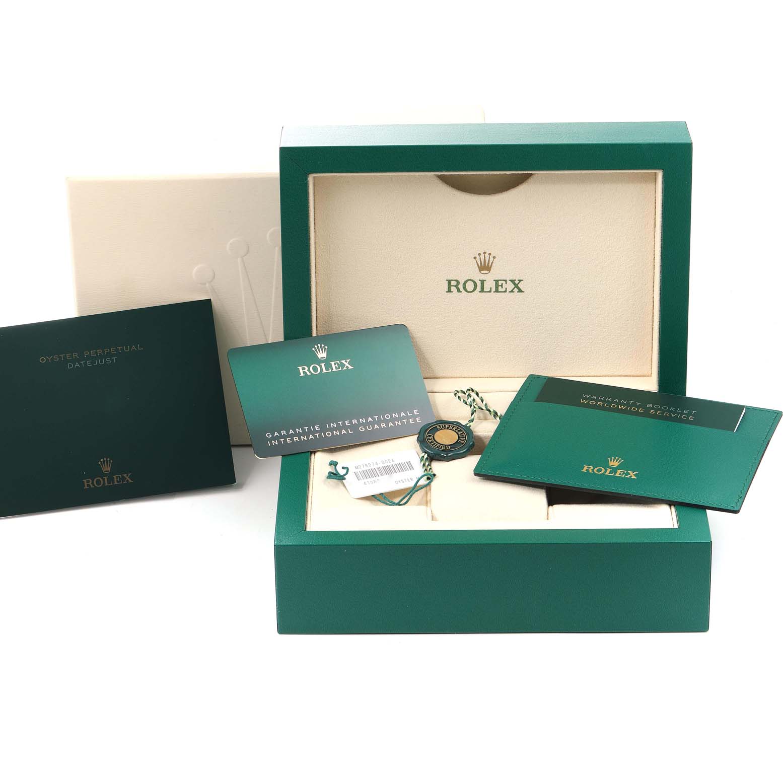 The image displays the open box, booklets, and guarantee card for a Rolex Mid-Size 278274 Women
s Stainless Steel Blue Dial 278274 Women
s Stainless Steel Blue Dial Oyster Perpetual Datejust watch.