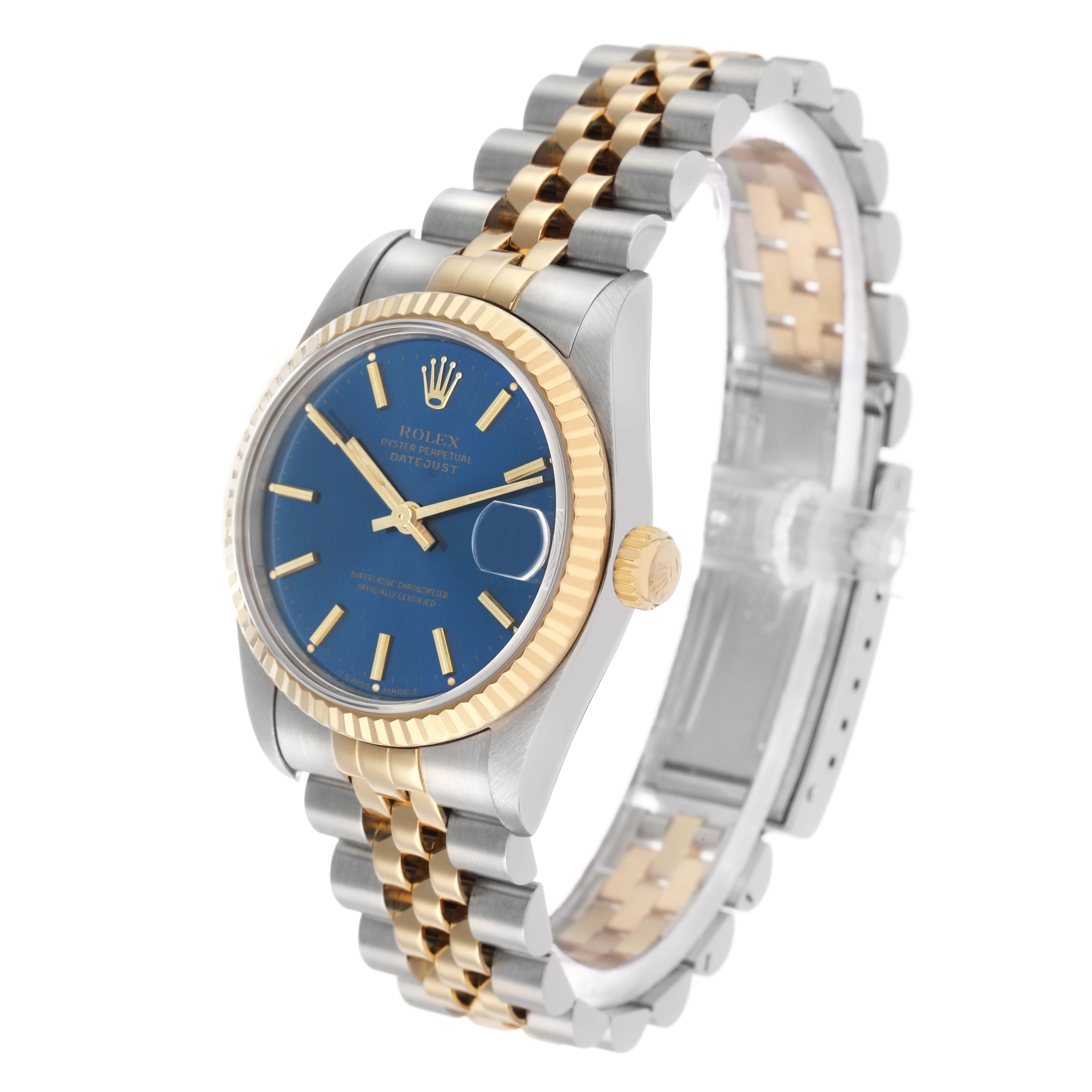 The Rolex Mid-Size 68273 Women's Steel and Gold (two tone) Blue Dial model is shown at an angle, displaying the face, bezel, crown, and part of the two-tone bracelet.