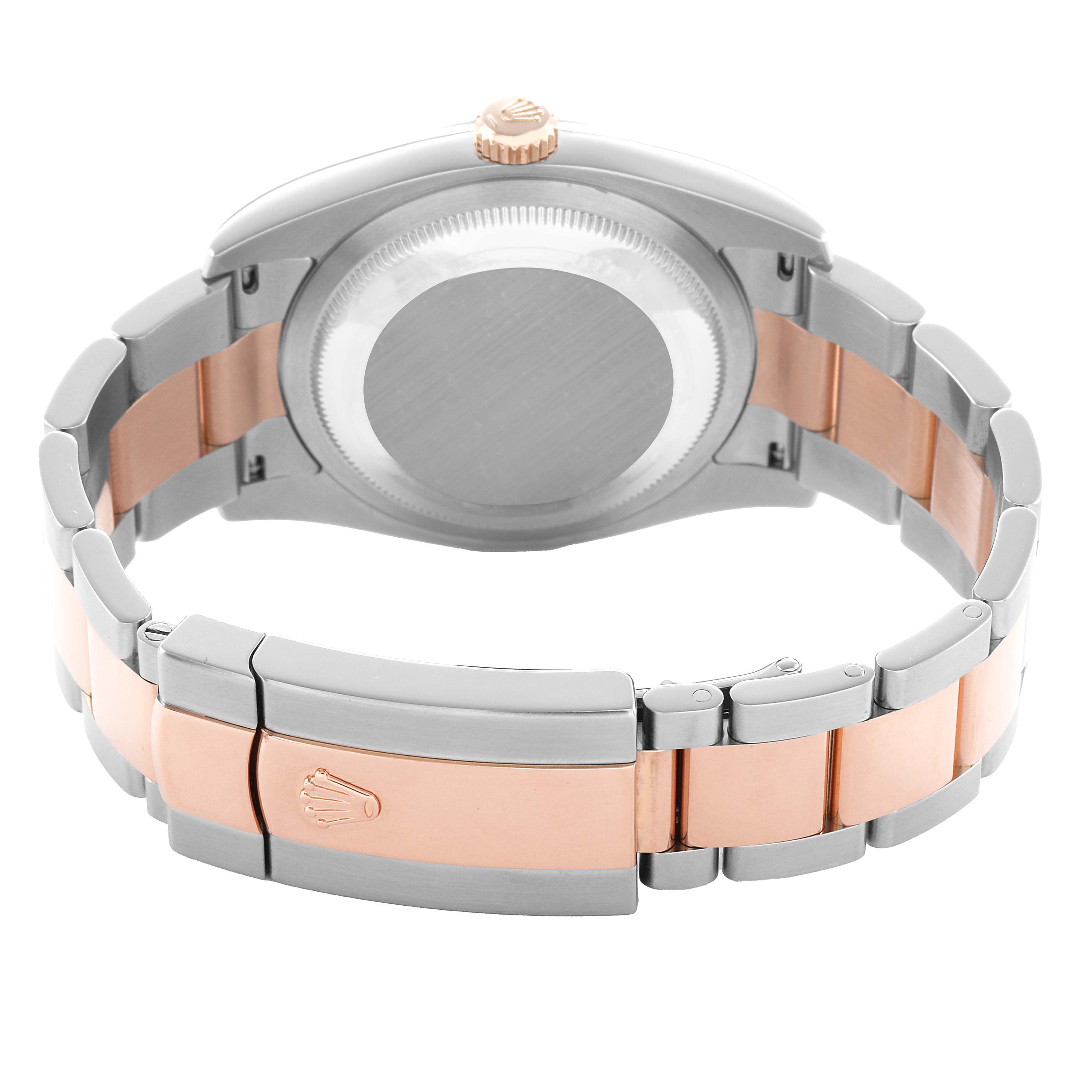 The Rolex Datejust 116201 Men's Steel and Gold (two tone) Silver Dial watch is shown from the back, highlighting the clasp, case back, and two-tone bracelet.