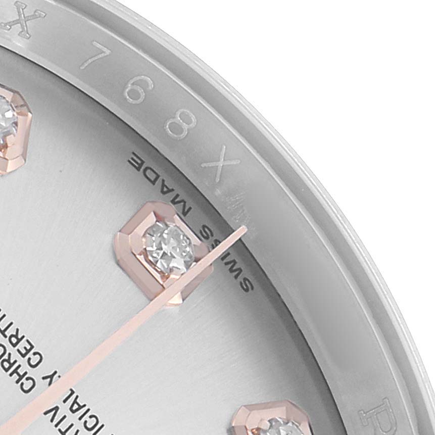 The image shows a close-up of the dial and diamond markers on a Rolex Datejust 116201 Men's Steel and Gold (two tone) Silver Dial watch.