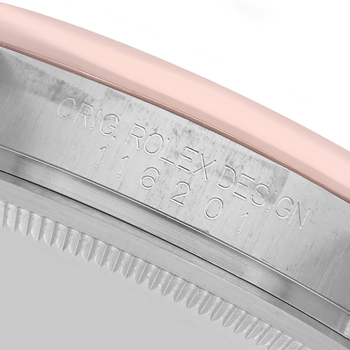 The image shows a close-up of the case side with engraved text on a Rolex Datejust 116201 Men's Steel and Gold (two tone) Silver Dial model.