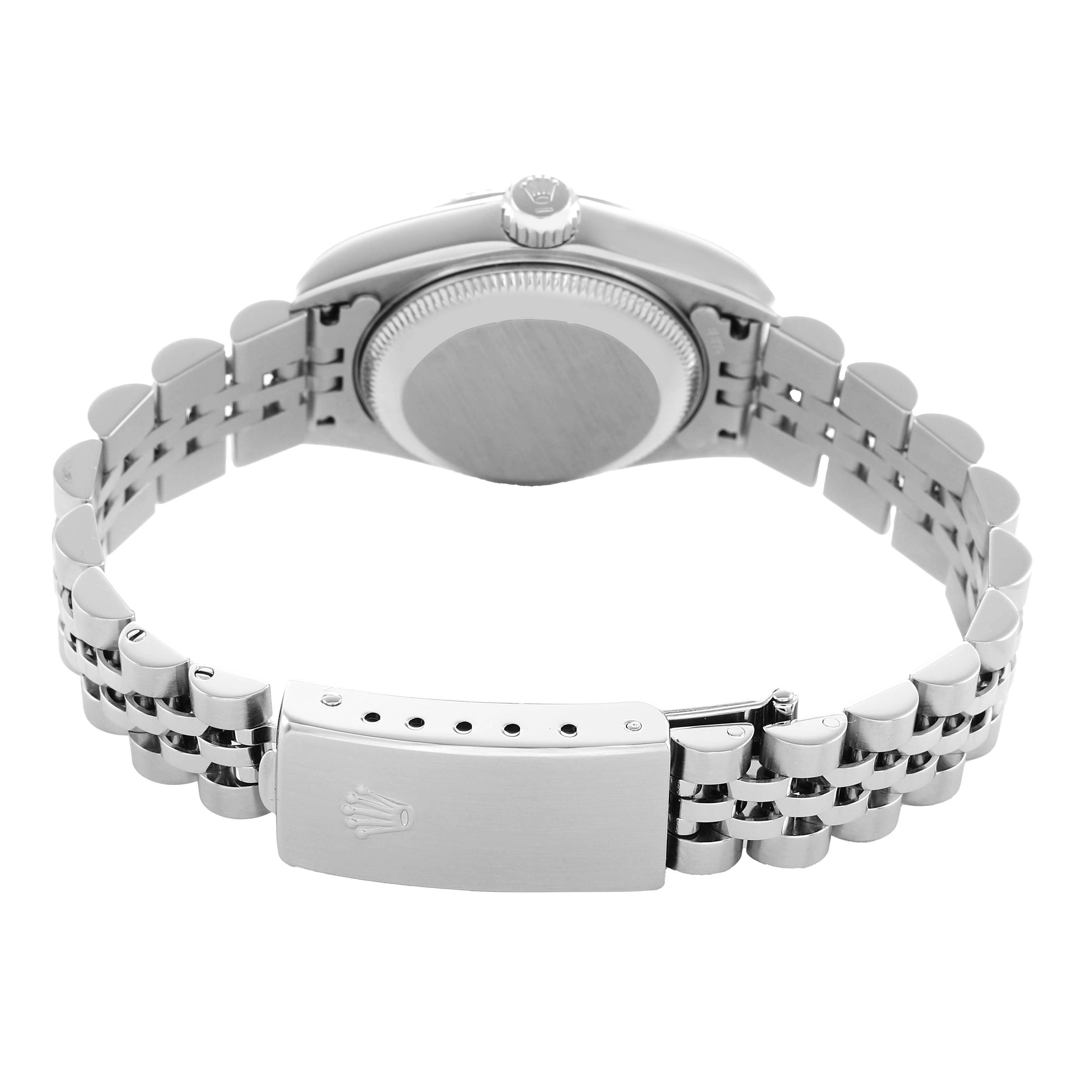 The Rolex Datejust 79174 Women's Stainless Steel Pink Dial watch is shown from the back, highlighting the bracelet clasp, case back, and crown.