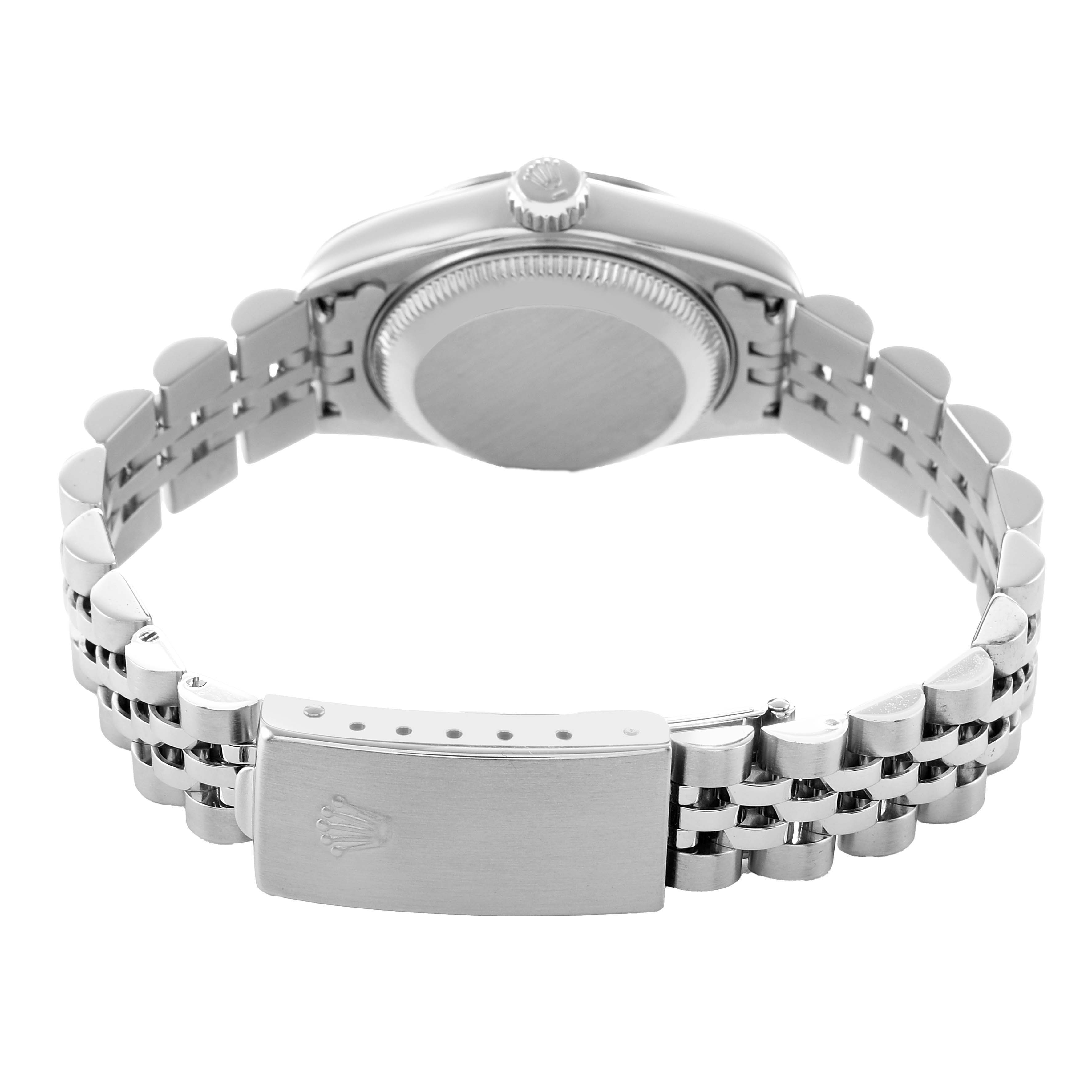 The image shows the back view of a Rolex Datejust 79174 Women's Stainless Steel Pink Dial, highlighting the bracelet, clasp, and case back.