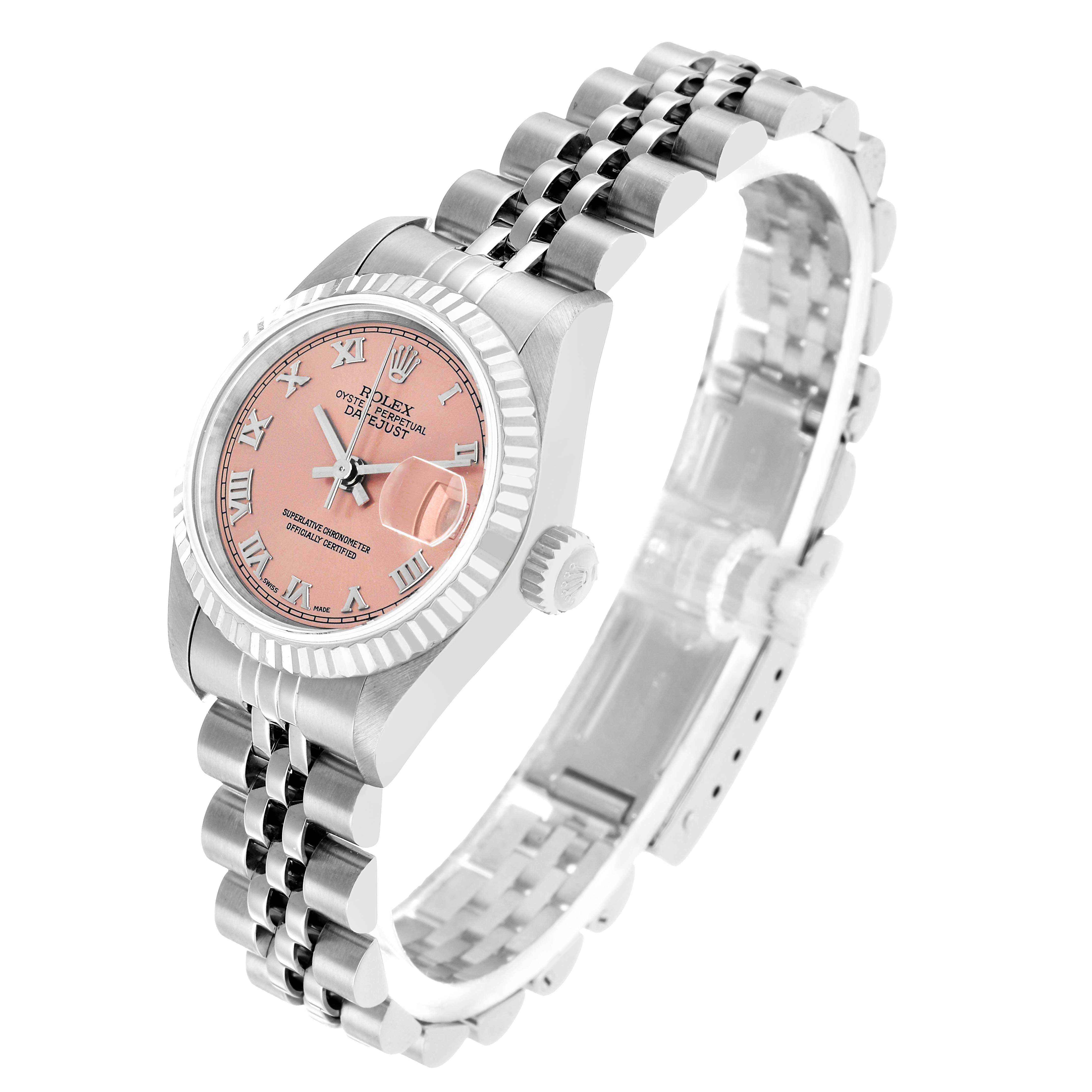 The Rolex Datejust 79174 Women's Stainless Steel Pink Dial watch is shown at a slight angled view, highlighting the dial, bezel, crown, and metal bracelet.