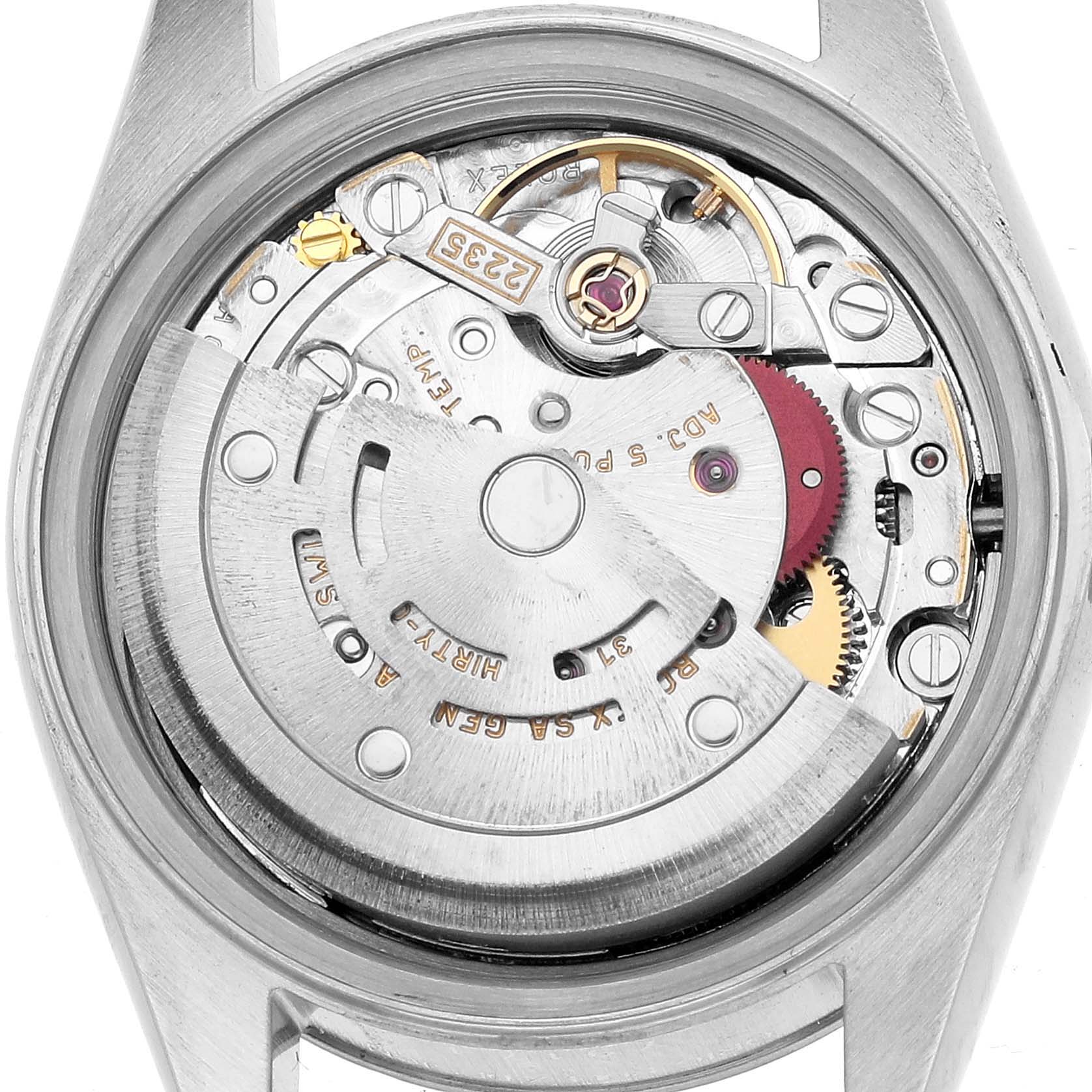 The image shows the movement of a Rolex Datejust 79174 Women's Stainless Steel Pink Dial watch from a back angle, highlighting its intricate internal components.