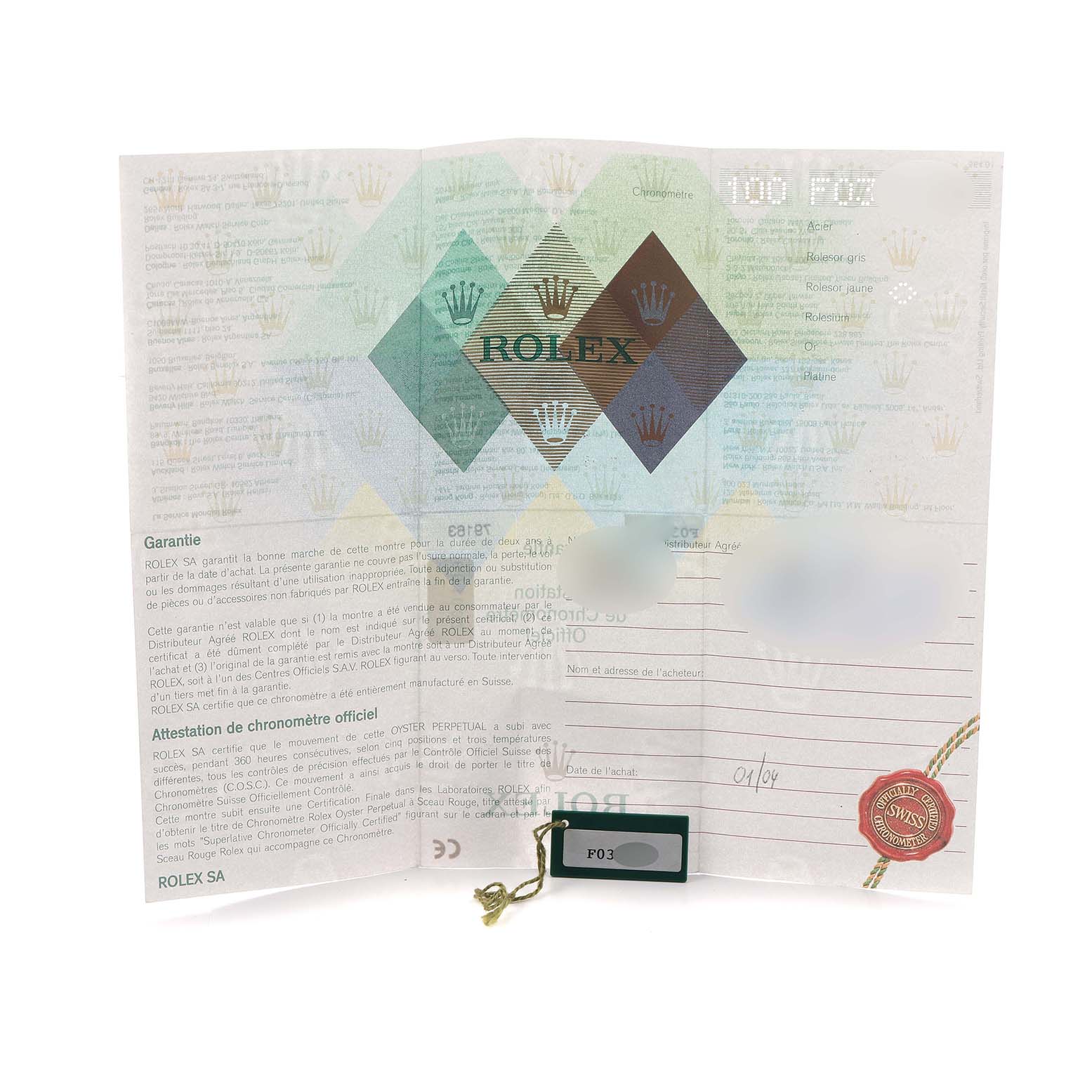 This image shows the warranty card and tag for the Rolex Datejust 79163 Women's Steel and Gold (two tone) Beige Dial model, featuring official documentation.