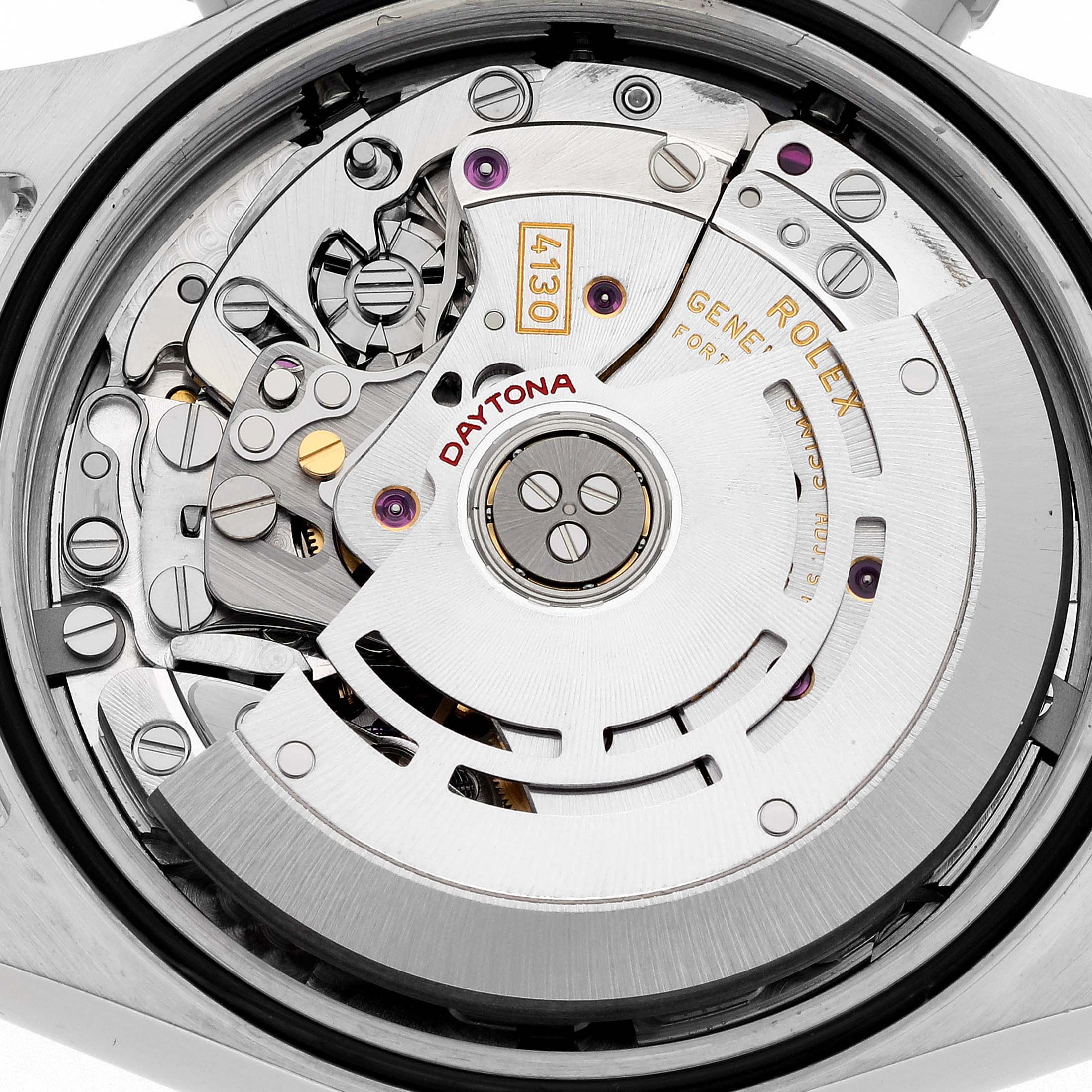 The image shows the intricate movement of a Rolex Daytona 116520 Men's Stainless Steel White Dial 116520 Men's Stainless Steel White Dial watch, viewed from the back, highlighting its rotor and mechanical parts.